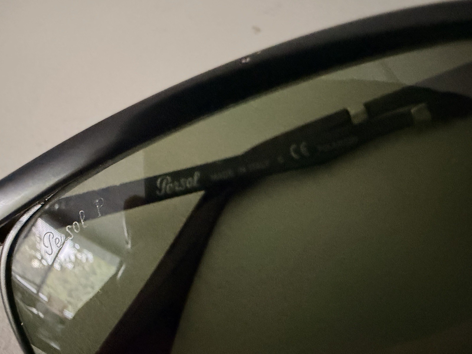 Persol Key West Polarised Sunglasses Black Metal Frame Green Tinted Lenses