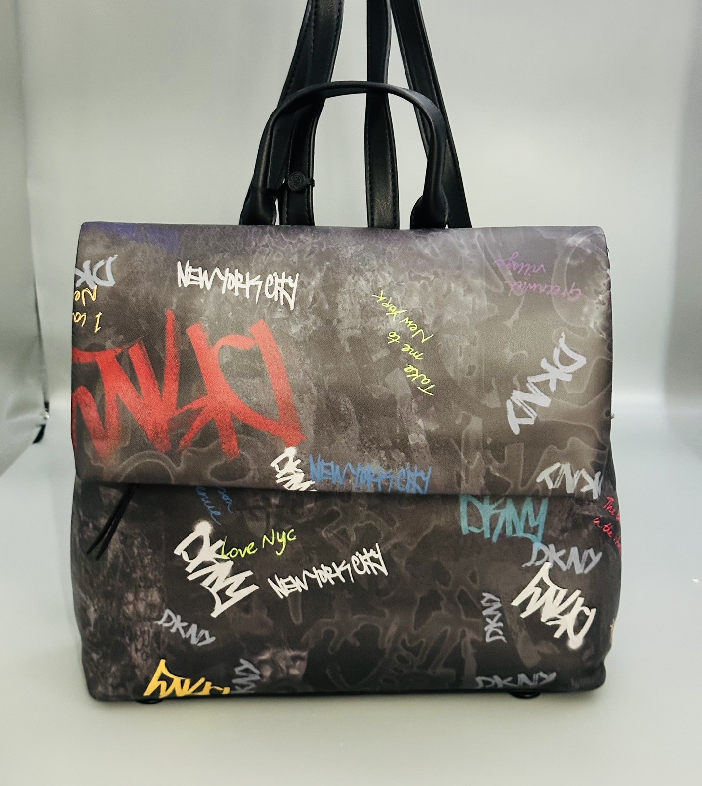DKNY: Graffiti Tilly Flap Backpack, NWT W. Adjustable Straps