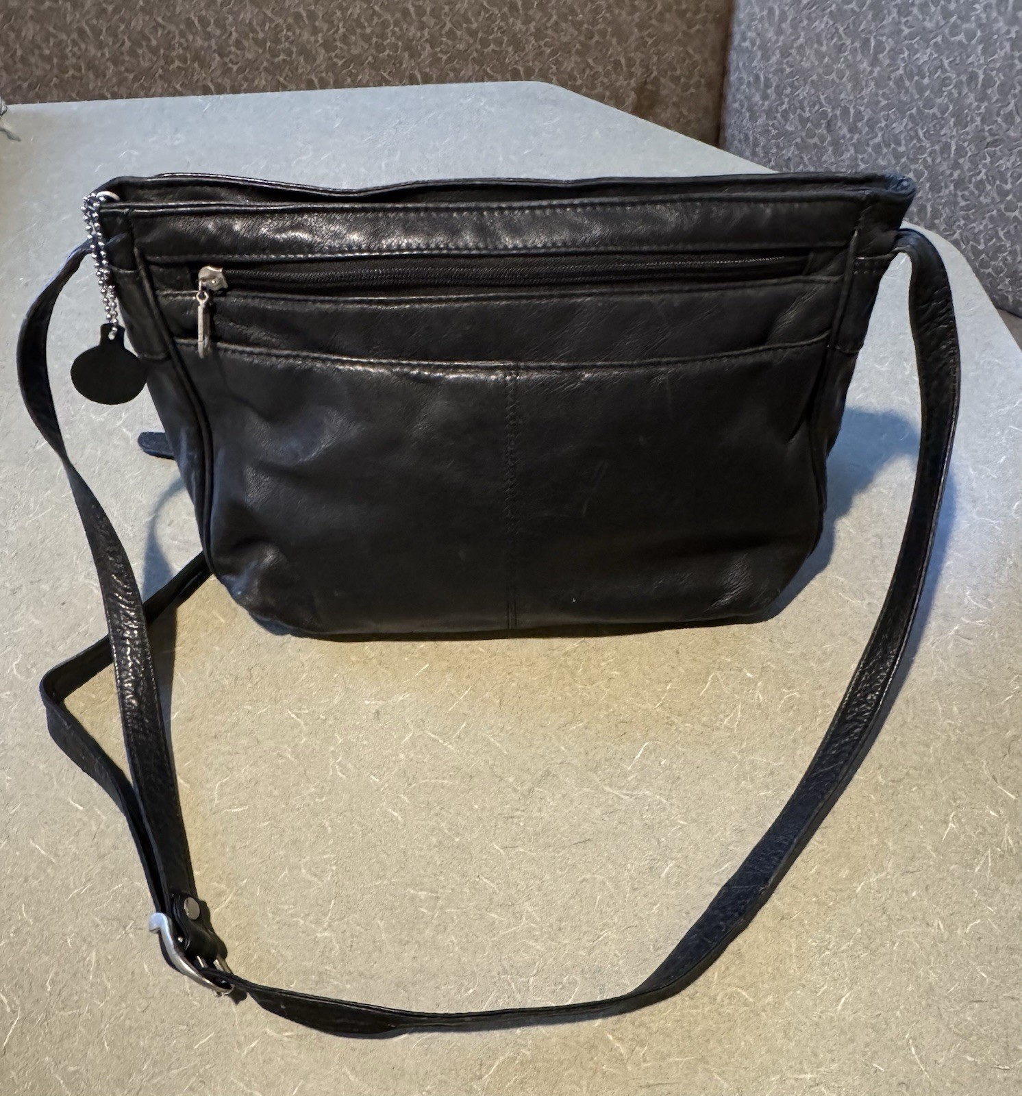 Wilsons Black Leather Shoulder Bag Buckle Accent Zipper Outer Pockets Classic
