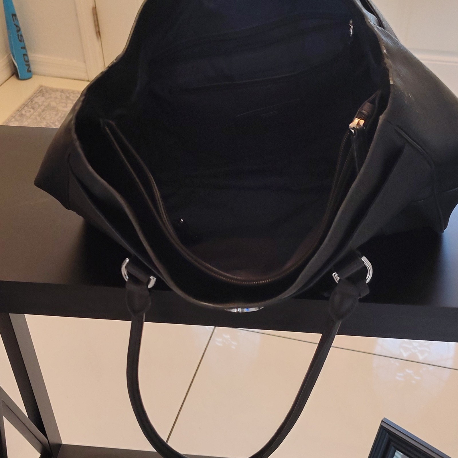 Tumi Black Buckle Accent Women’s Tote with Inner Pockets & Bottom Studs