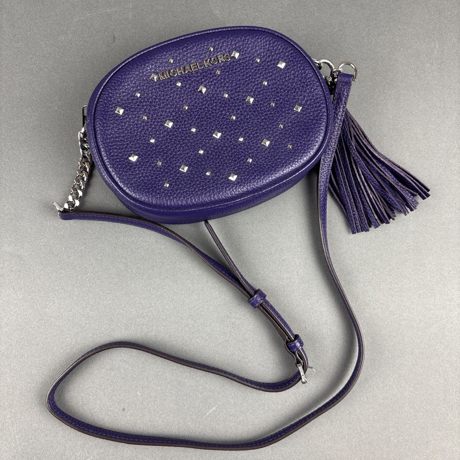 Michael Kors Purple Pebbled Leather Small Oval 7.75″x5.5″ Crossbody Bag w/Tassel