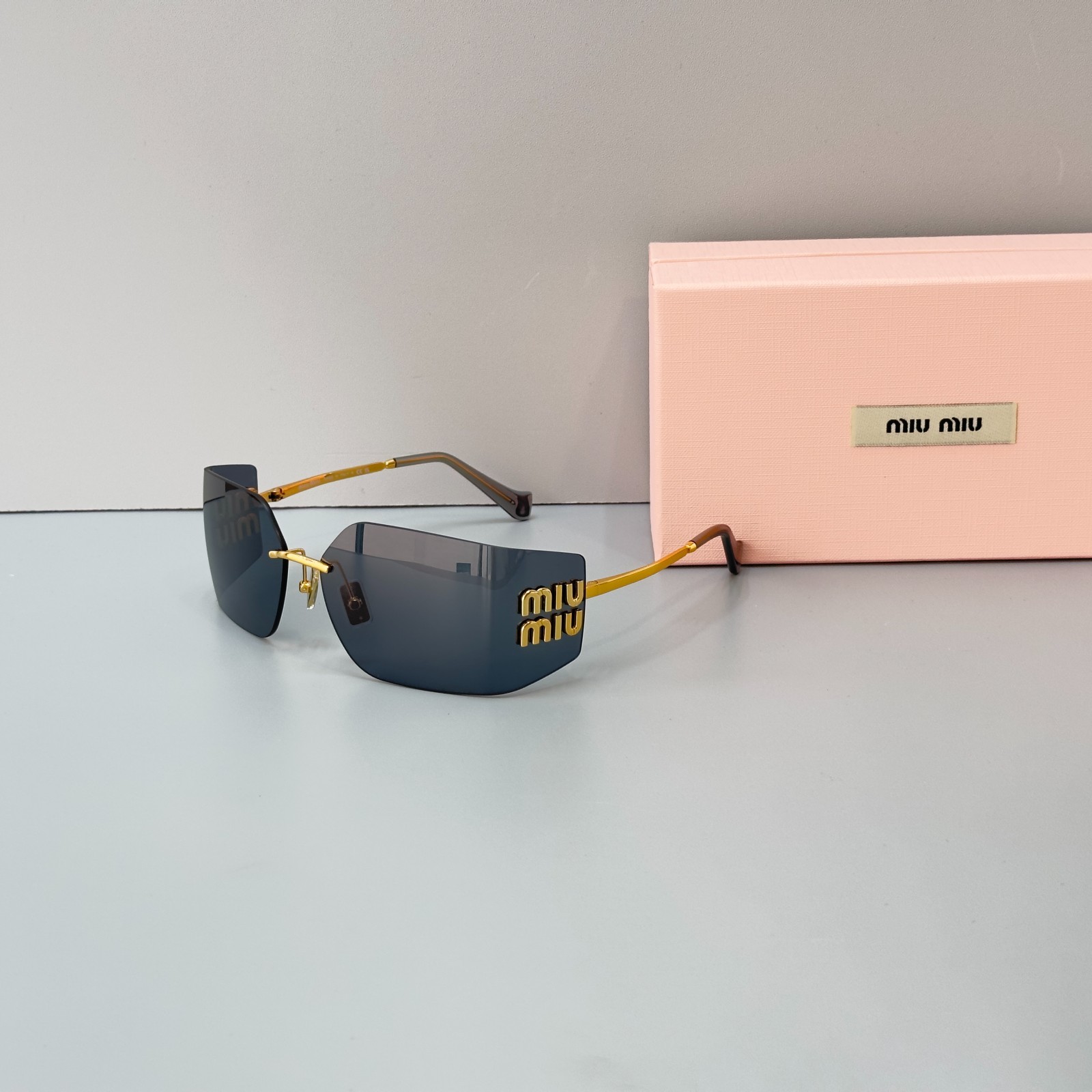 Miu Miu MU54YS Gold Frame Gray Lens Rimless Shield Sunglasses Italy