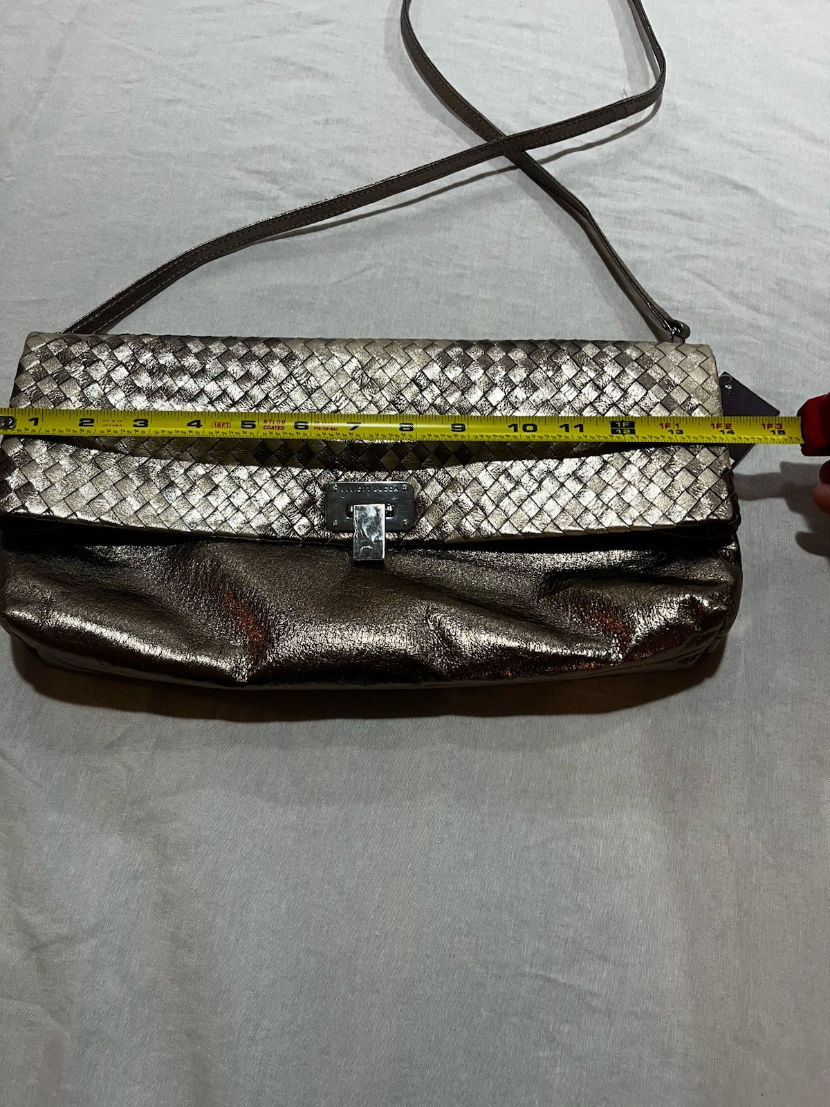 Elliott Lucca metallic woven leather convertible clutch/crossbody bag.