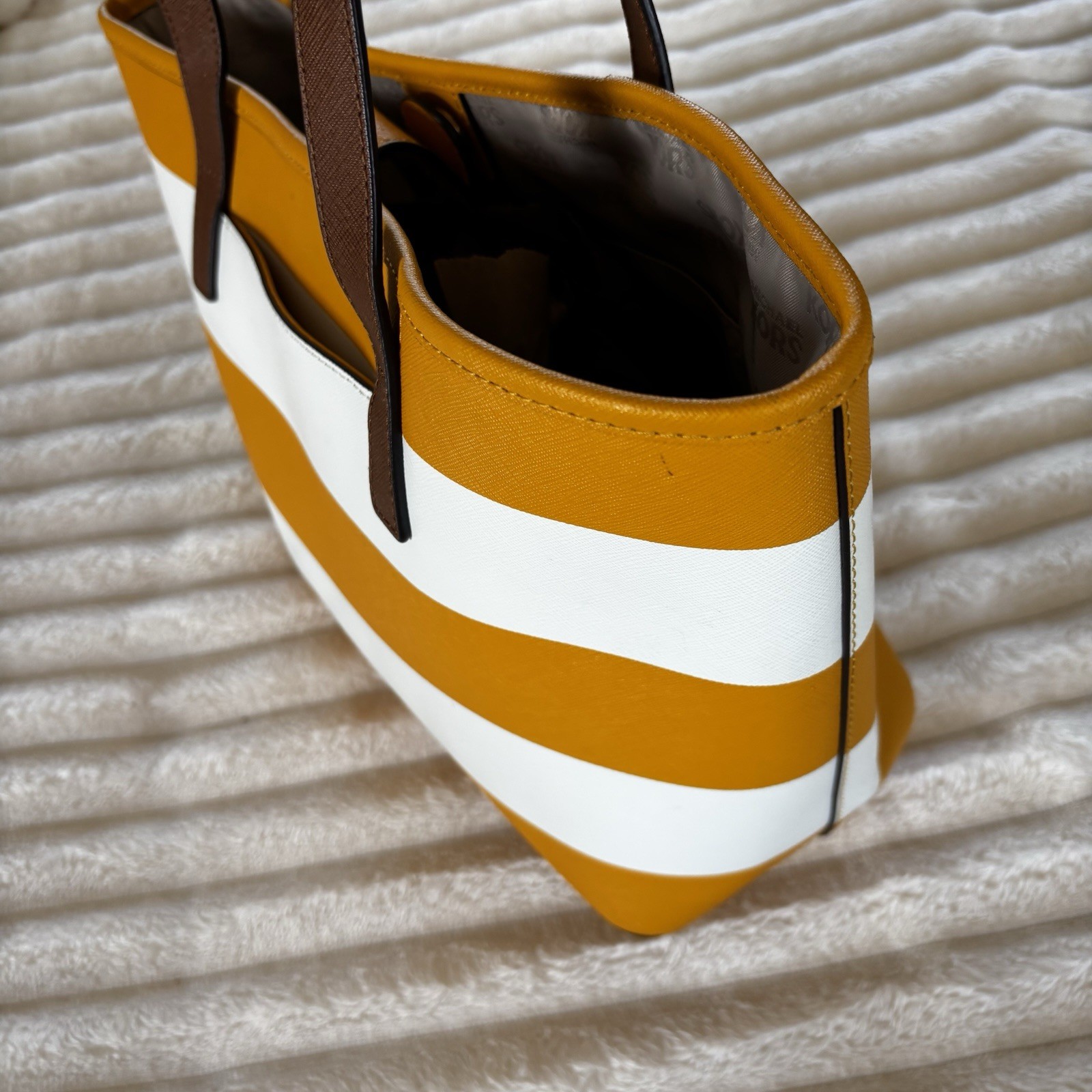 Michael Kors purse, Yellow And White Stripped, With Brown Straps.