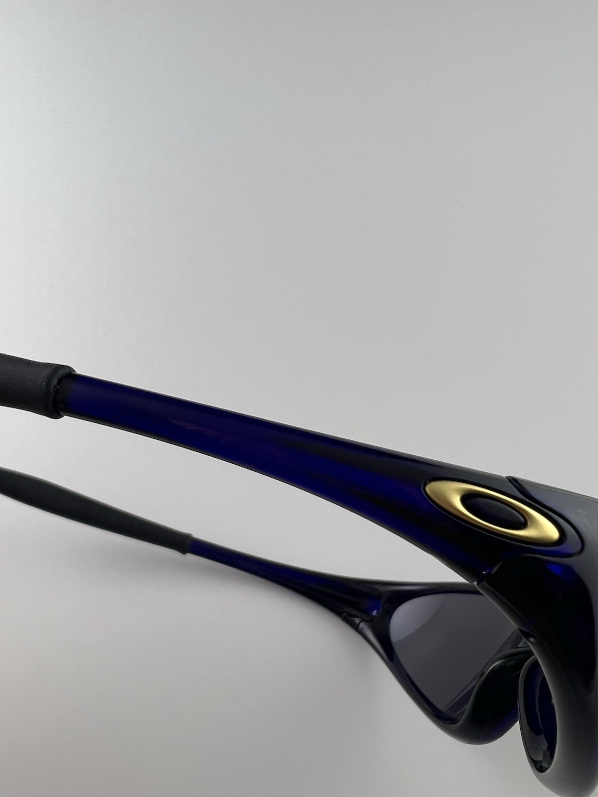 Oakley Minute 1.0 Crystal Blue Frame Black Iridium Lens Gold Icons XX RARE
