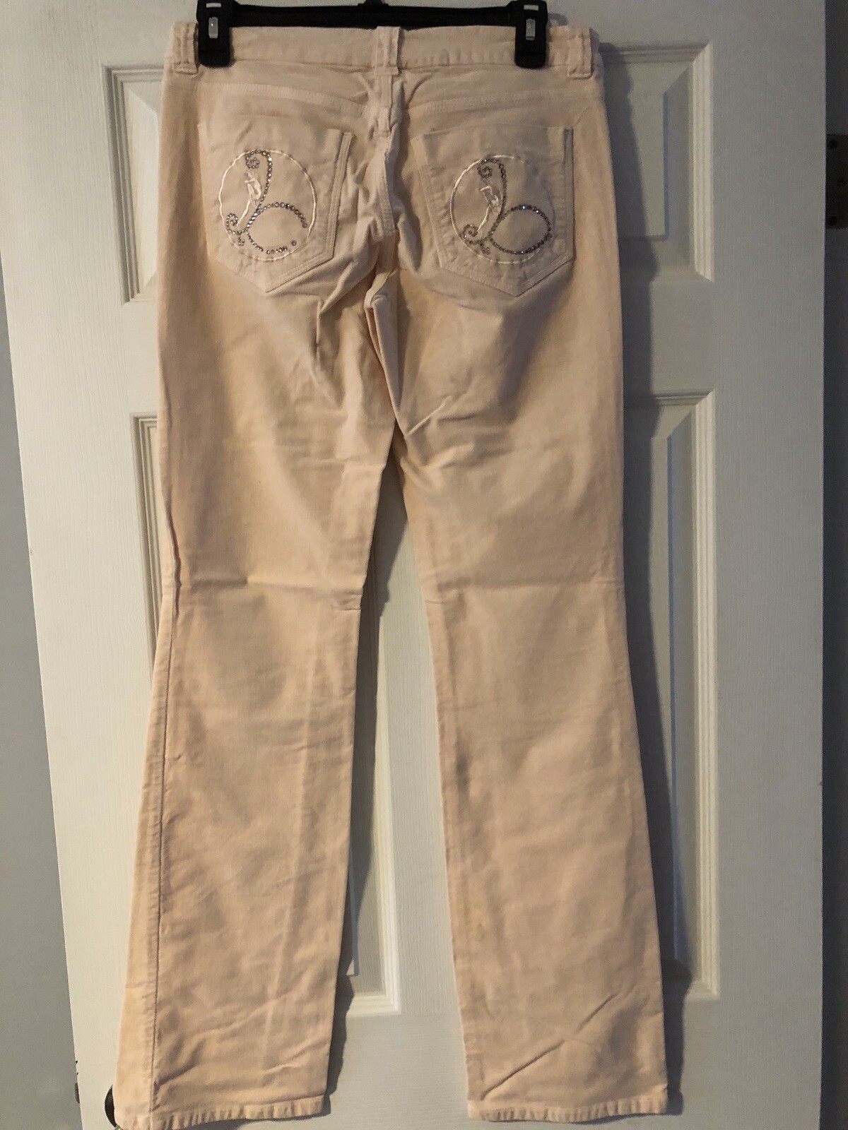 Bebe Size 27 Stretch to the fabric Good Condition