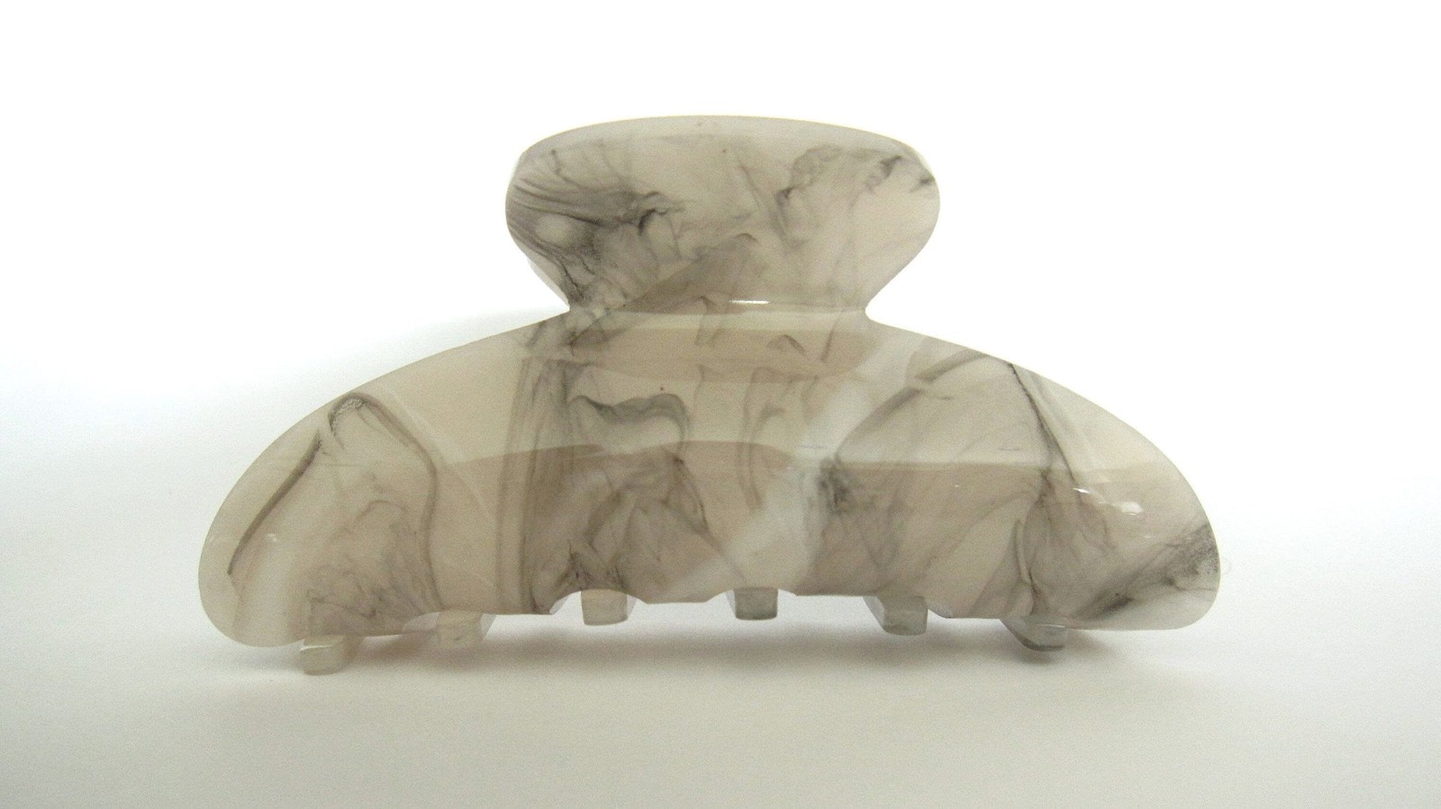 One random marbled beige white black gray acrylic hair claw clip