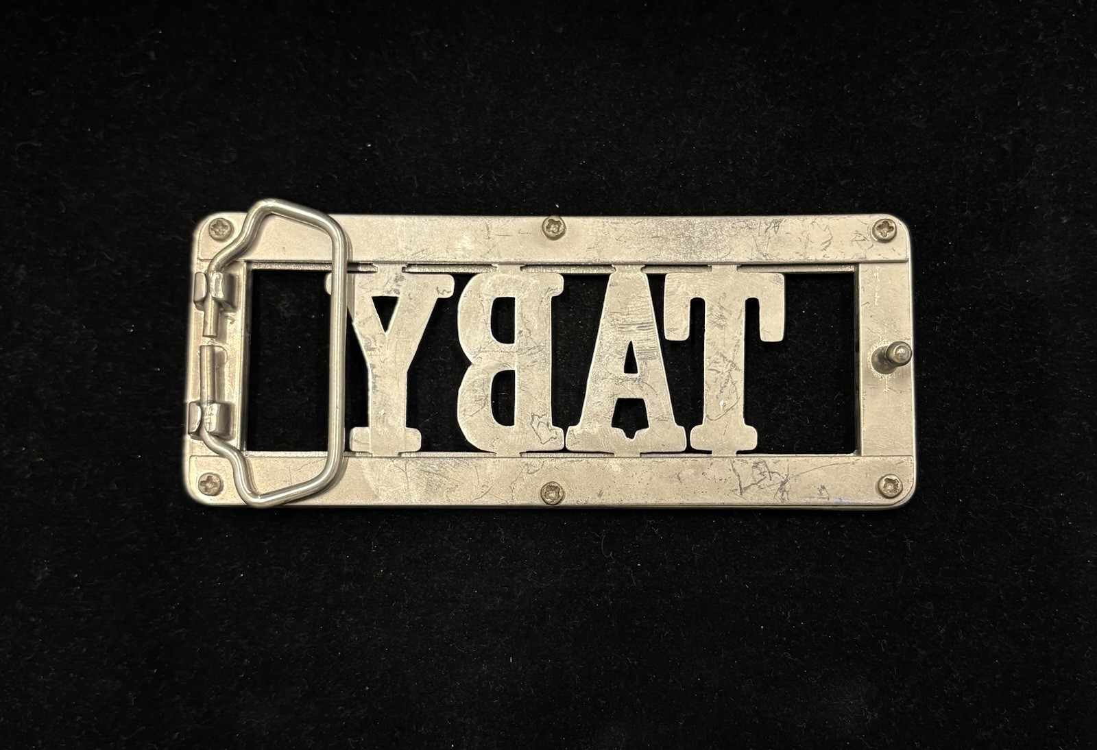 vintage Y2K-style belt buckle features “TABY” rhinestones rectangular frame RARE