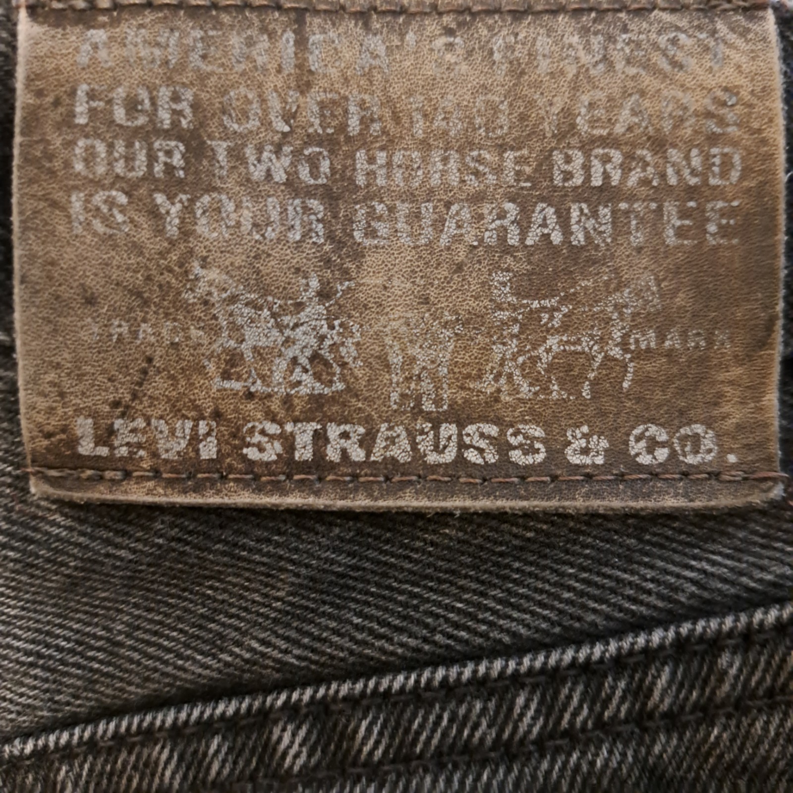 Vintage Levi’s 615 Orange Tab Jeans W34 L34 – Black Faded – Made in Tunisia