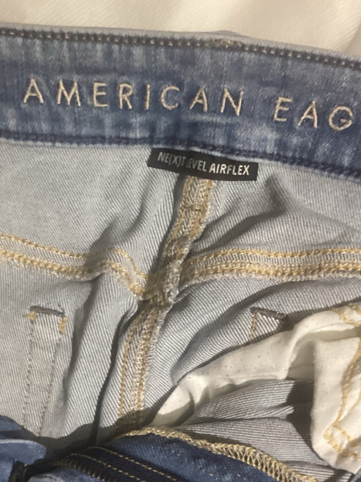 American Eagle Men’s Next Level Air Flex Slim US 33×32–Light Blue -Distressed