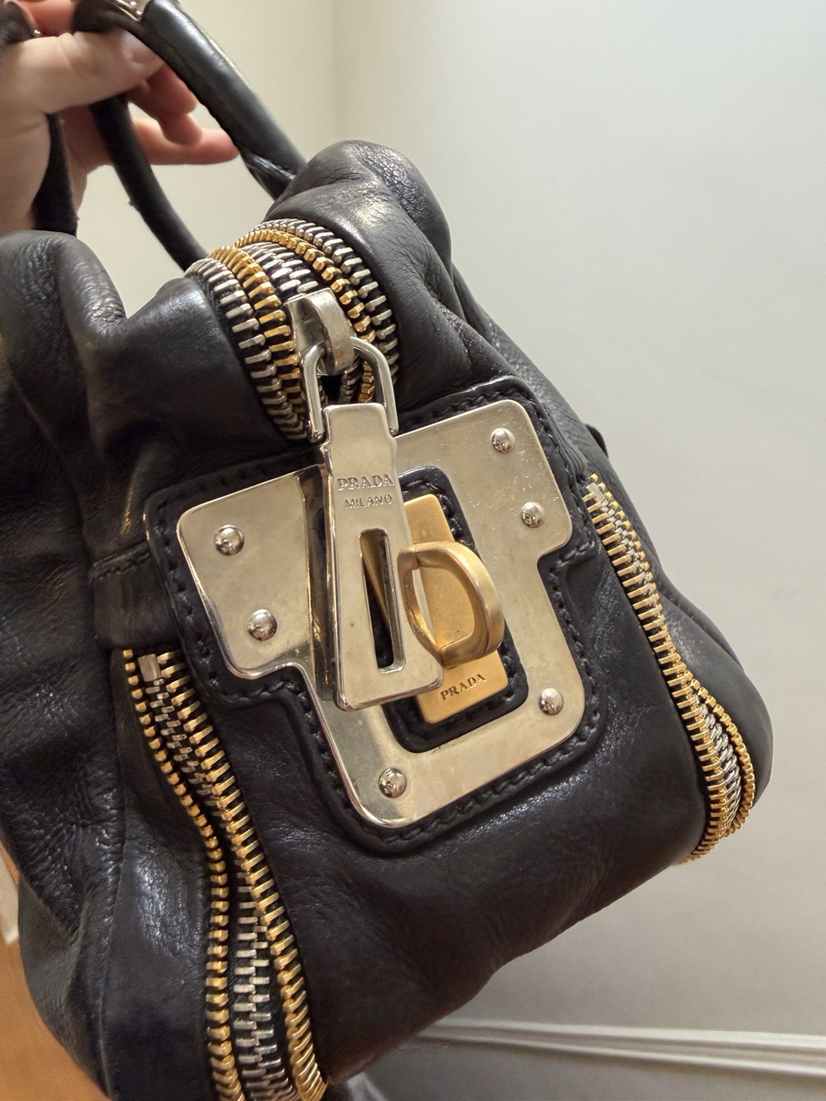 PRADA Black Top Handle Bag Gold Hardware Lock Buckle Accents Zip Closure