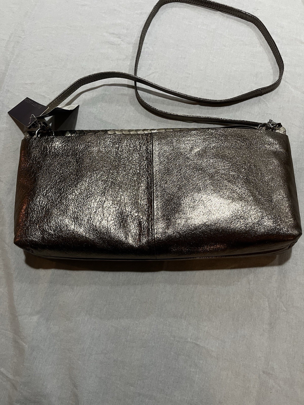 Elliott Lucca metallic woven leather convertible clutch/crossbody bag.