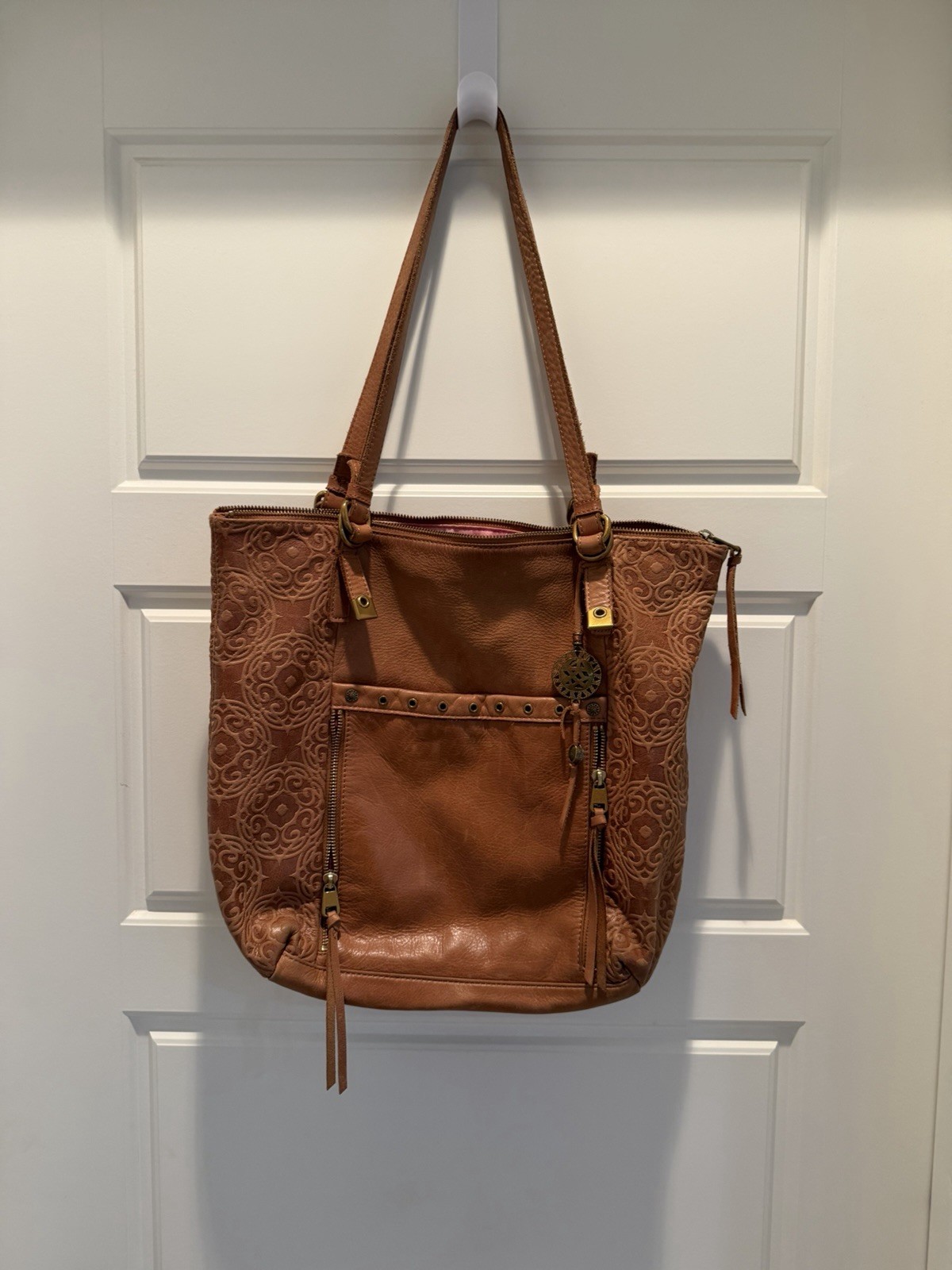 The Sak Brown Embossed Floral Tote Bag Zip Top Purple Lining Pockets Tassel