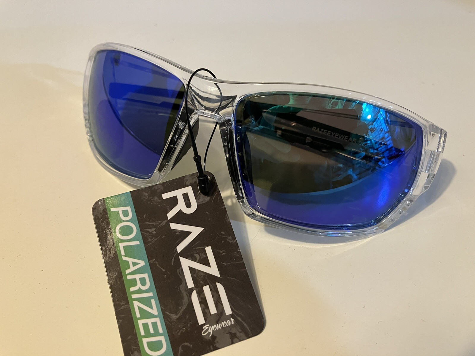 RAZE Eyewear Sunglasses Sonar Polarized Clear Frame Blue Mirror Smoke 28856