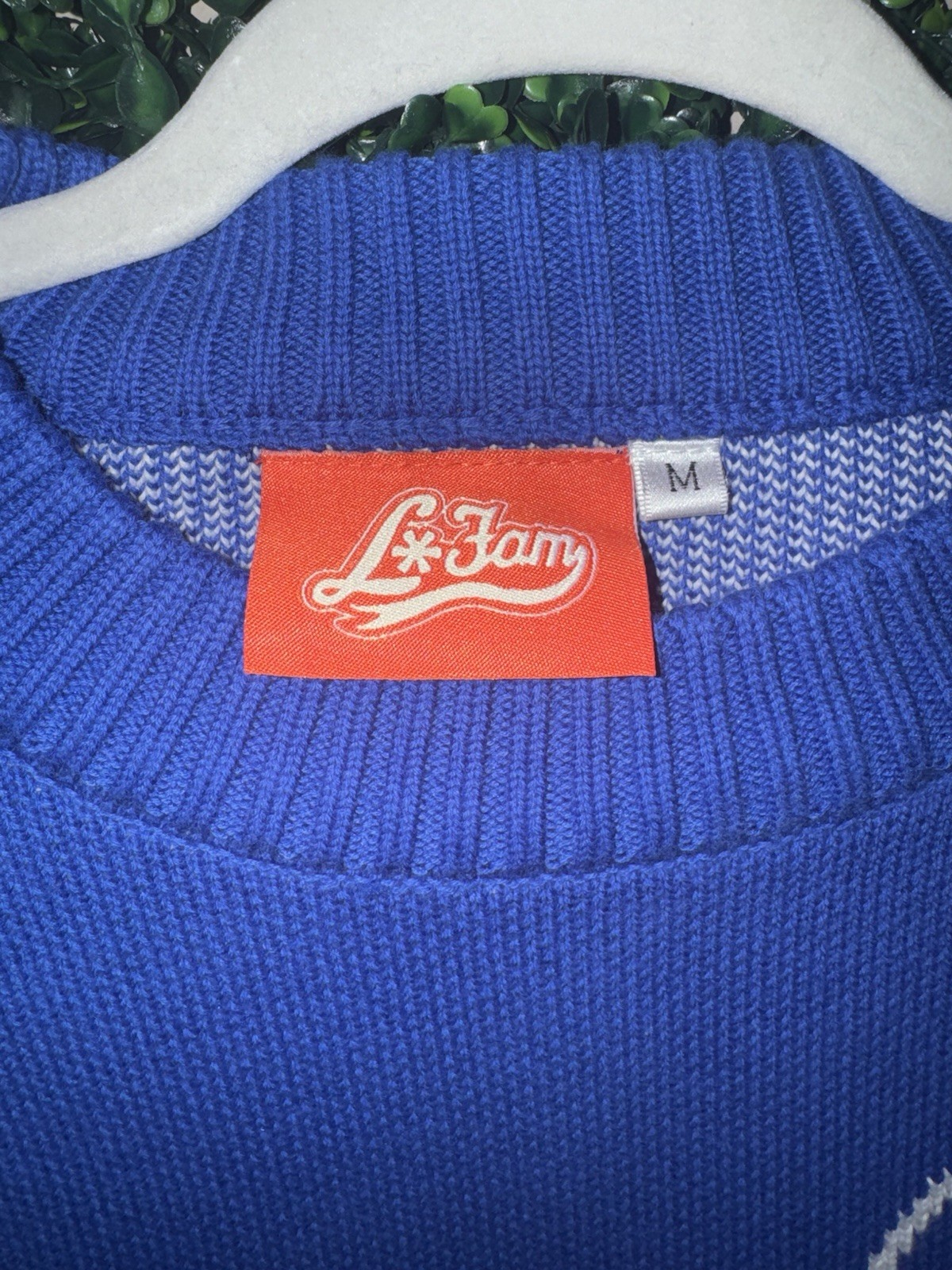 La Fam knit sweater. Style not currently available on brand website or online