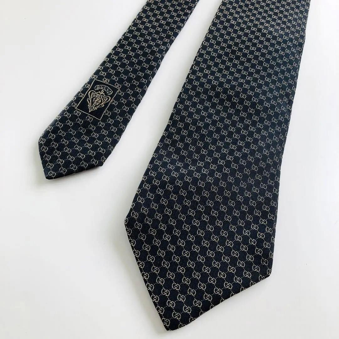 GUCCI Emblem Pattern Silk Tie Black Bronze 8.3cm Wide 154cm Long Pre-owned