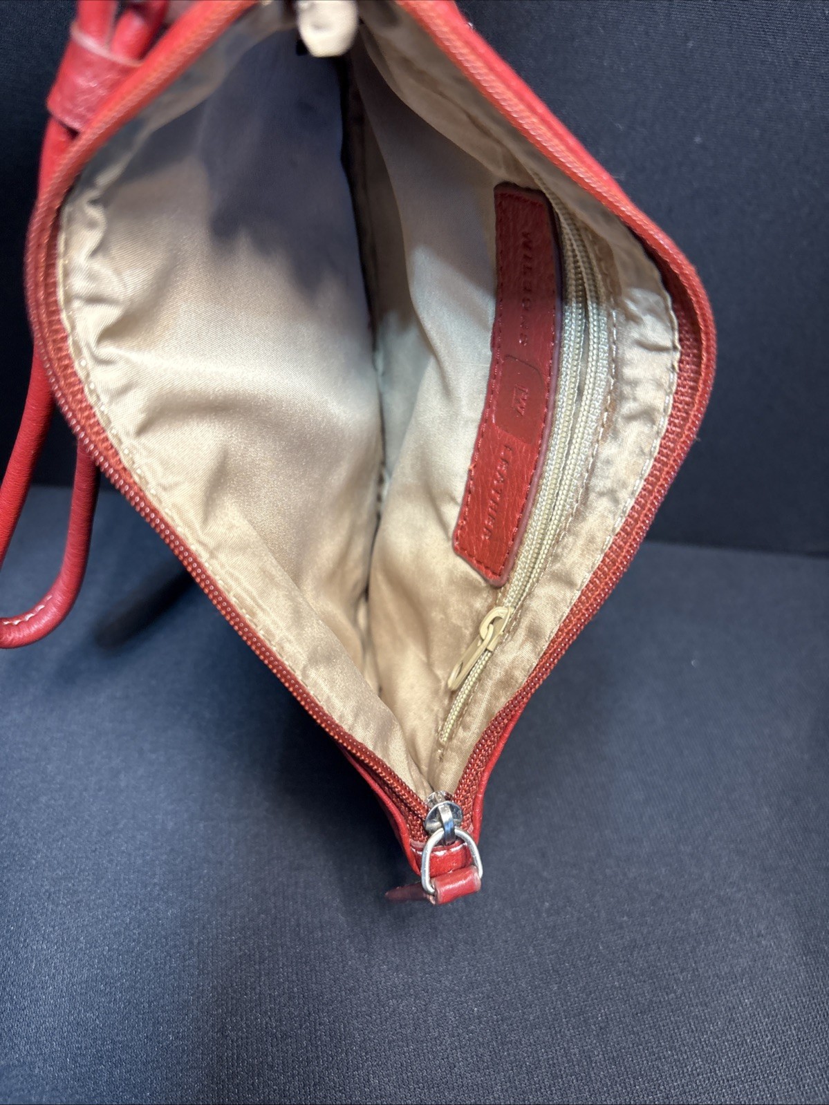 Wilson Leather Red leather buckle accent wristlet