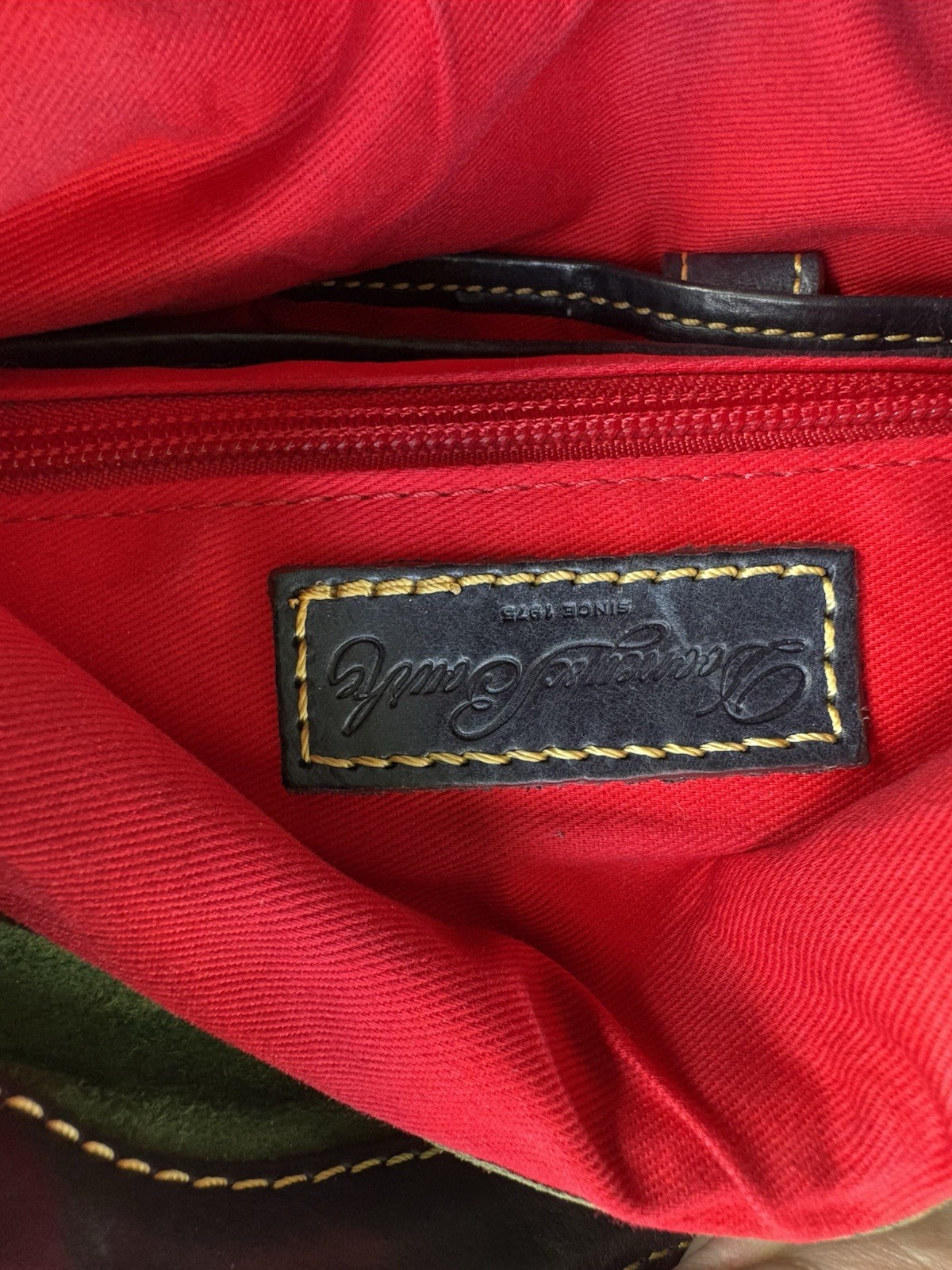 Dooney & Bourke Black Shoulder Bag Toggle/Zip Red Lined Pockets Gold Dust Bag