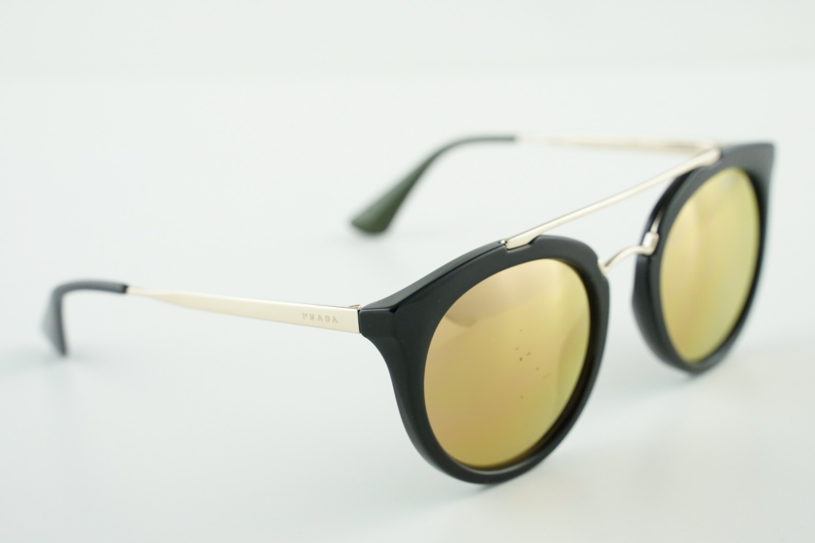 Pre-Owned SPR 23S Prada 1AB-5N2 Gold Polished Black/Mirrored Gold 52-22-140 3P