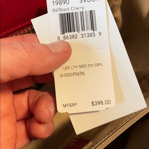Coach Legacy handbag in black cherry