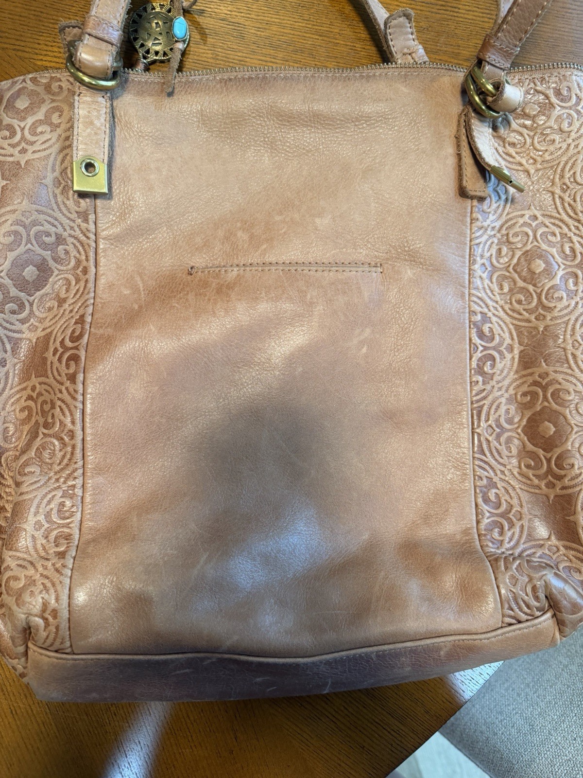The Sak Brown Embossed Floral Tote Bag Zip Top Purple Lining Pockets Tassel