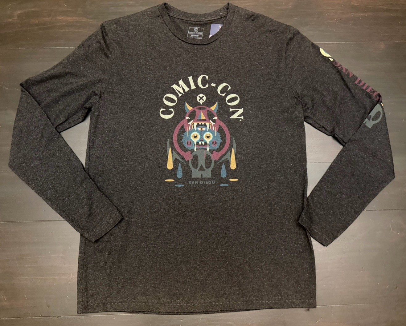NWT! [M] San Diego Comic Con SDCC LS T-shirt Black Neon Eye Official Merch $45