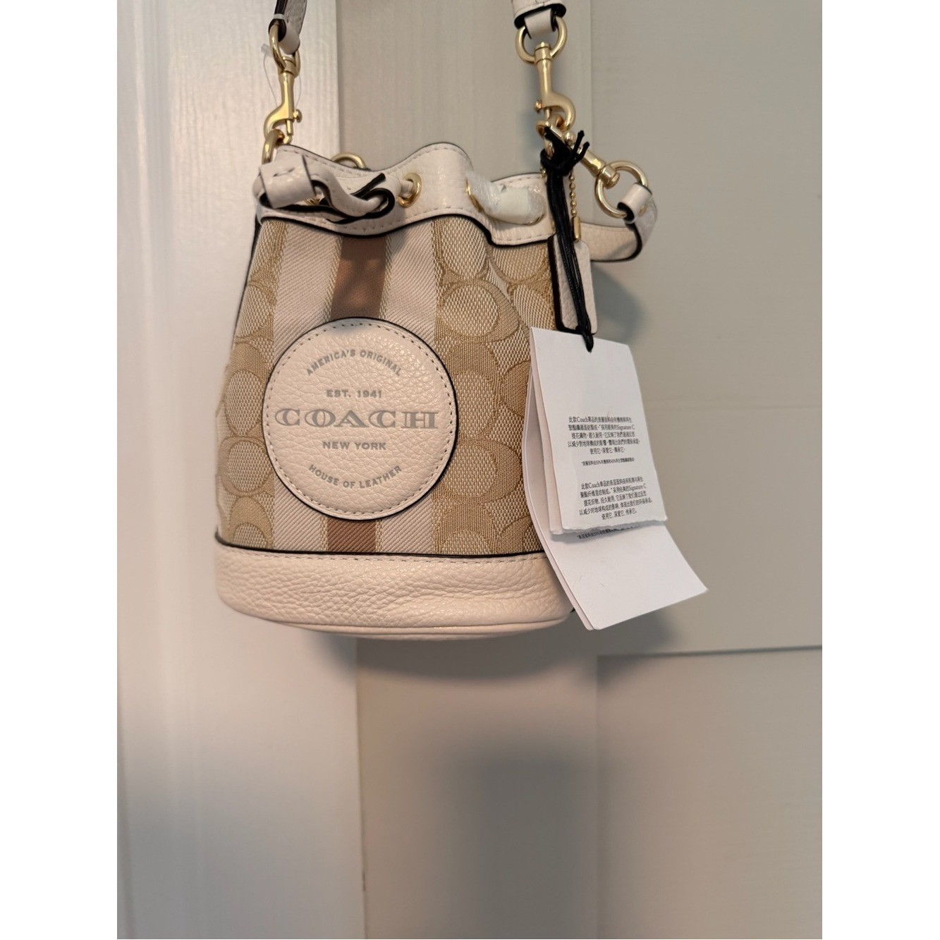 Coach Mini Dempsey Bucket Bag in Beige and White with Signature Logo