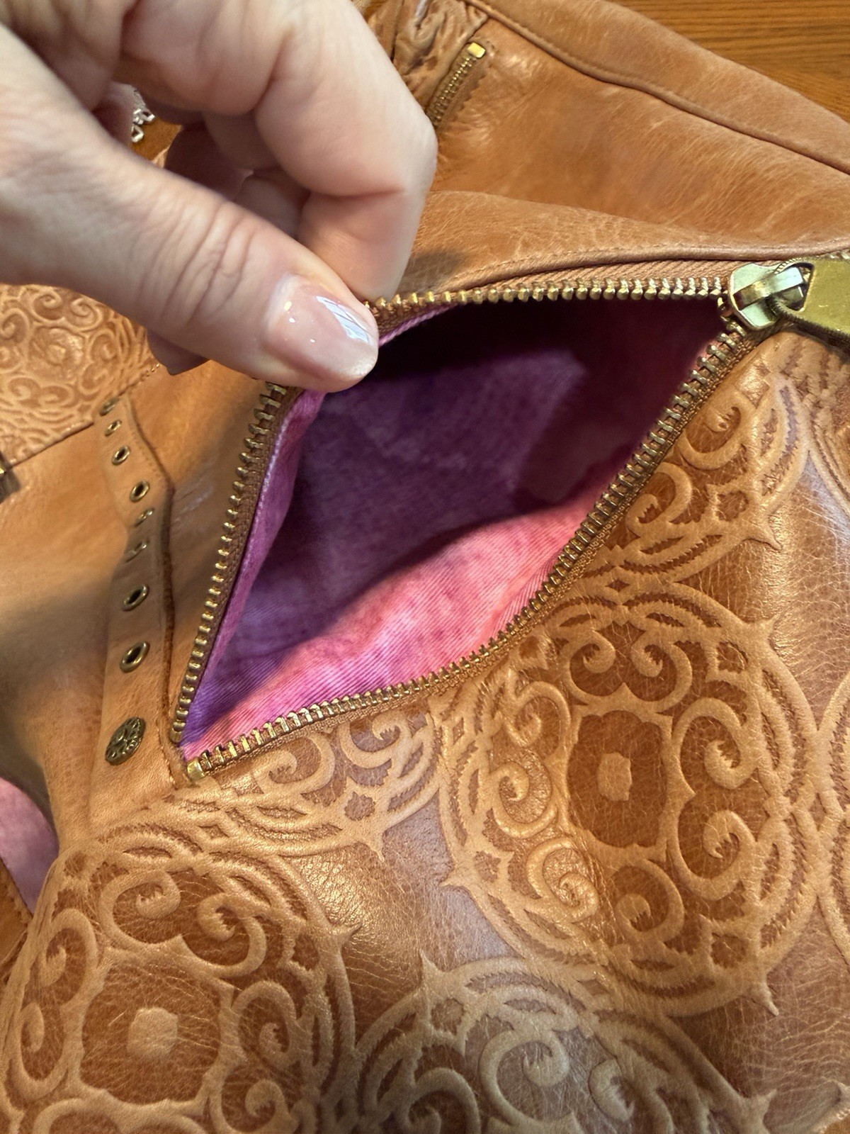 The Sak Brown Embossed Floral Tote Bag Zip Top Purple Lining Pockets Tassel
