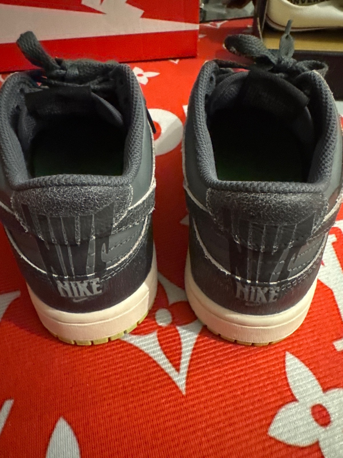 Nike Dunk Low SE “Halloween” sneakers in a grey and black colorway, featuring a