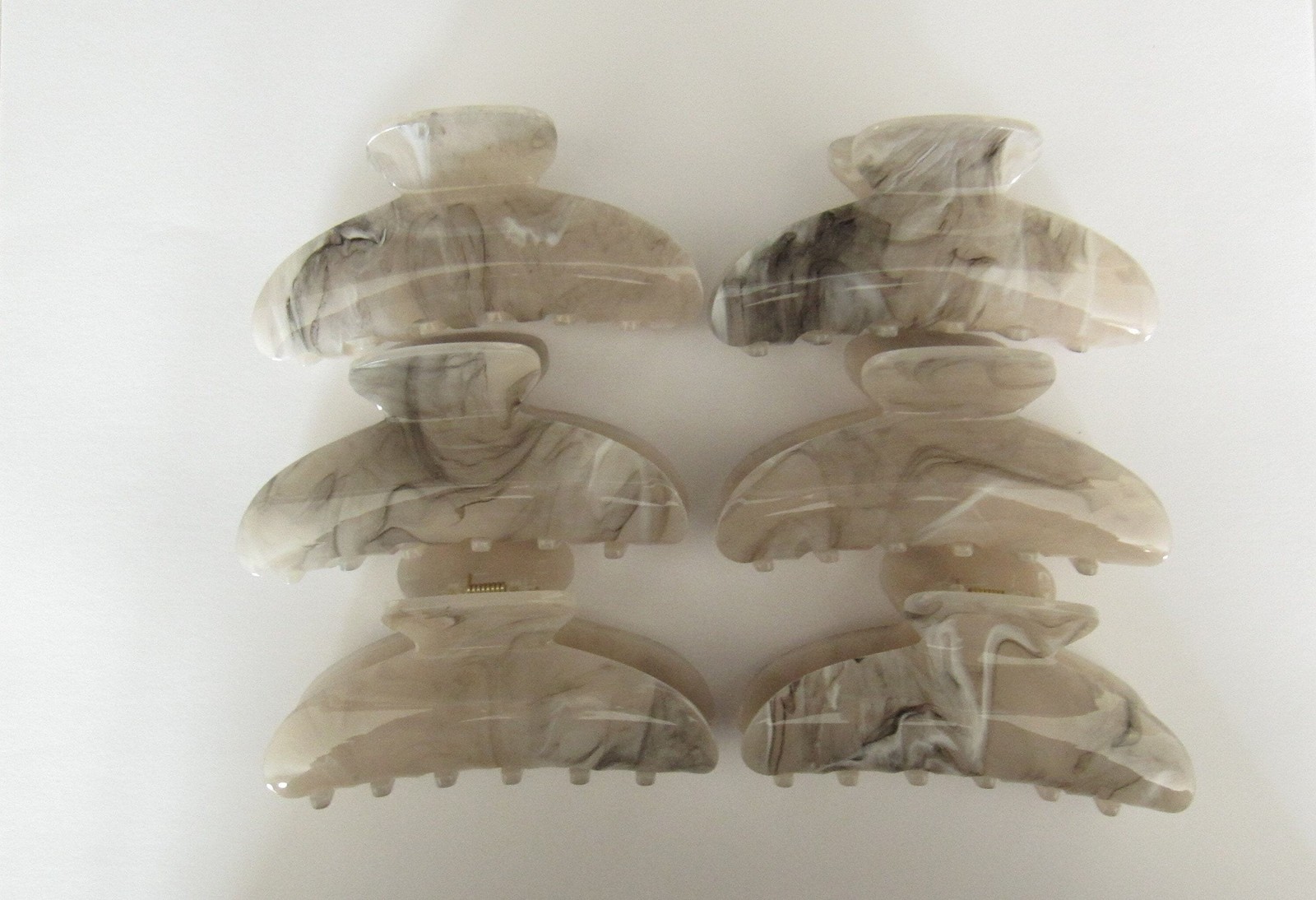 One random marbled beige white black gray acrylic hair claw clip