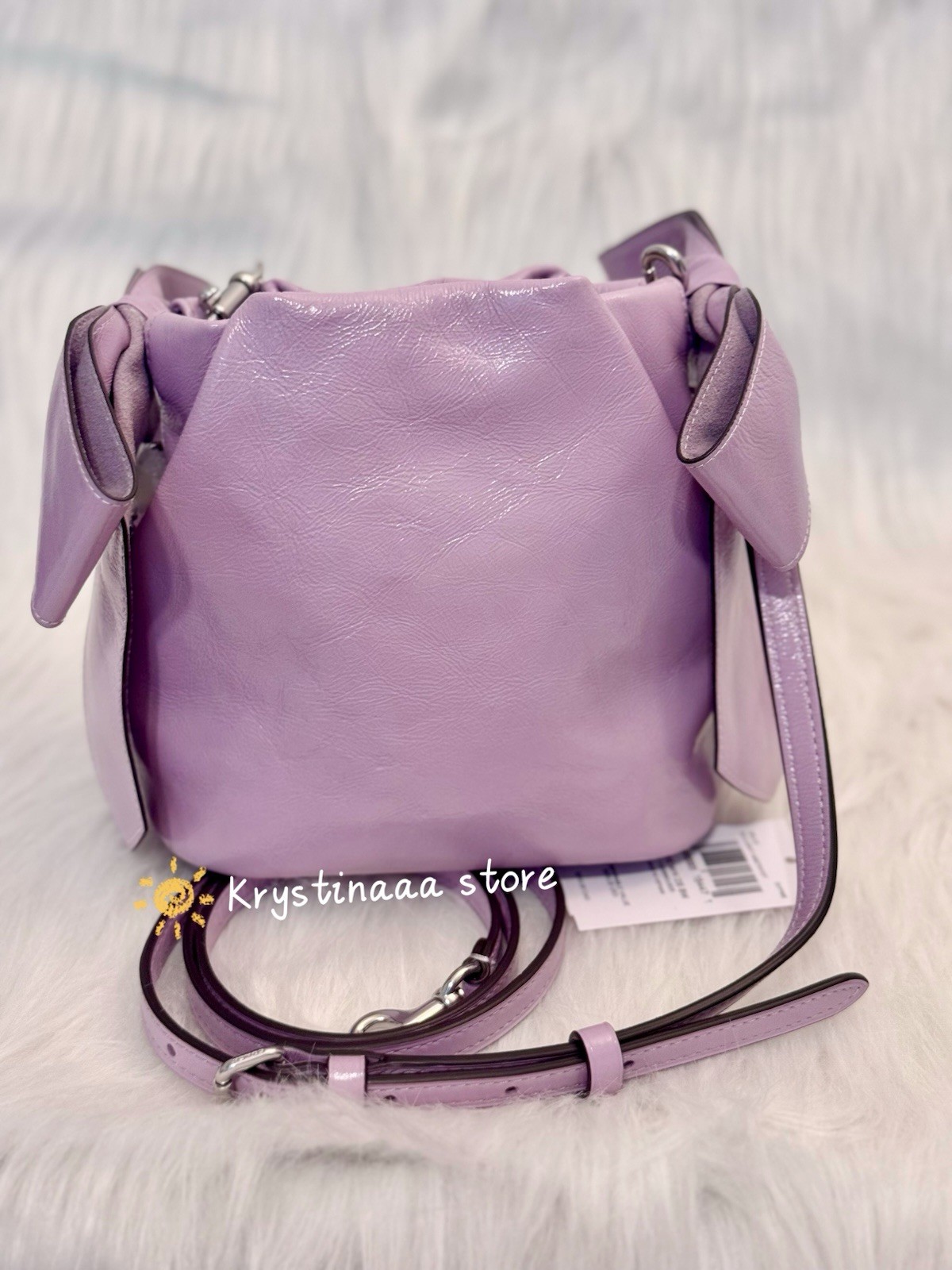 NWT Coach Faye Mini Drawstring Bag With Bows CEL03 in Light Amethyst Leather