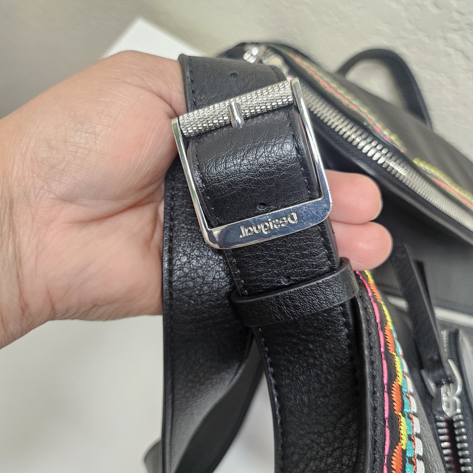 Midsize backpack,multicoloured embroidery,magnetic flap closure, zip, pockets.