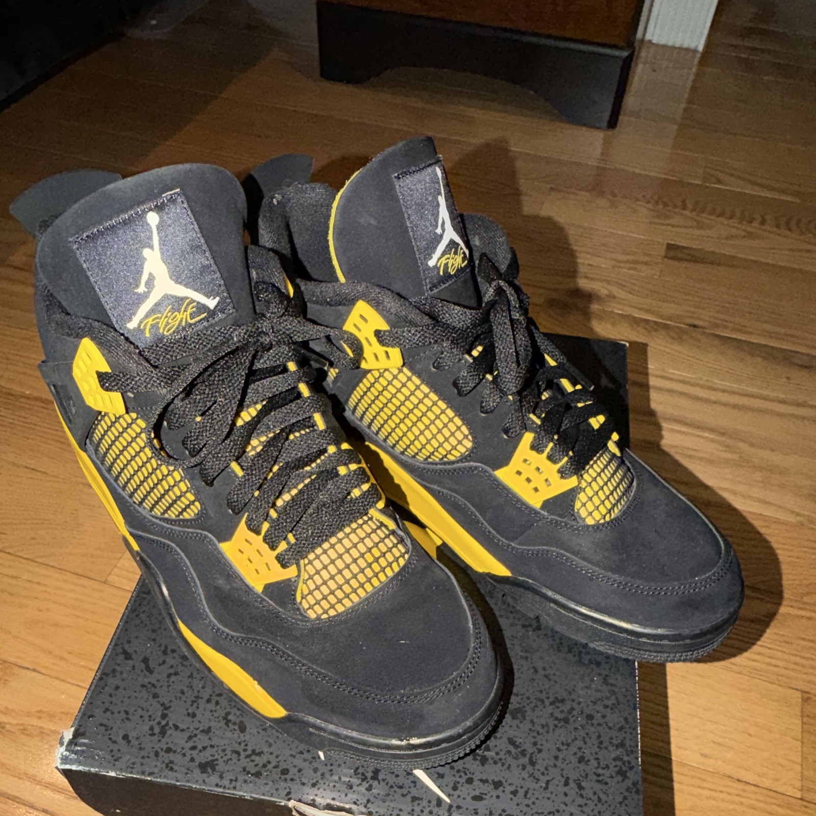 Jordan Air Jordan 4 Retro Thunder 2023 Black/Tour Yellow DH6927-017 Men’s