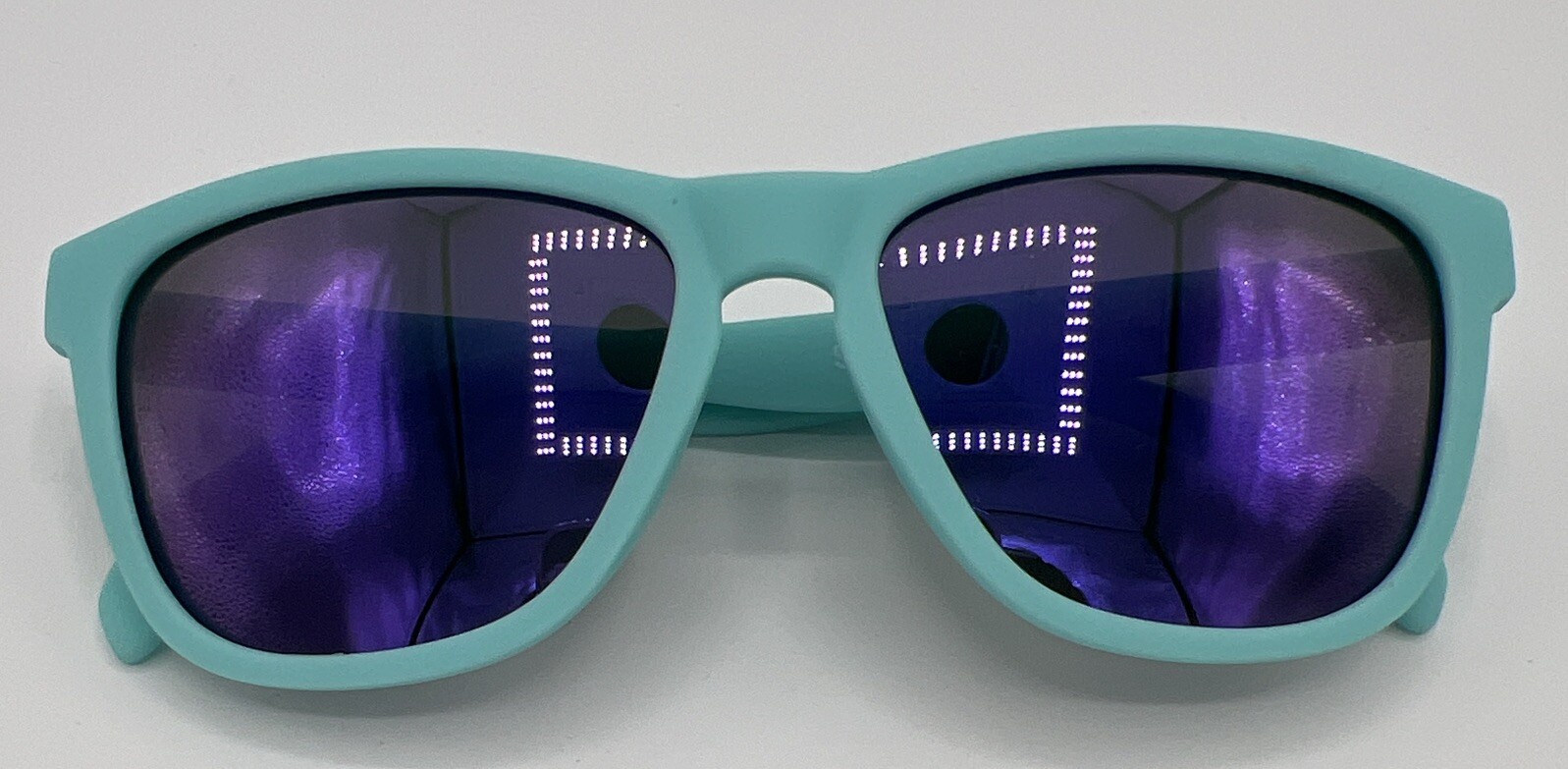 Goodr Sunglasses “Electric Dinotopia Carnival” Active Teal PurpLens OG Polarized