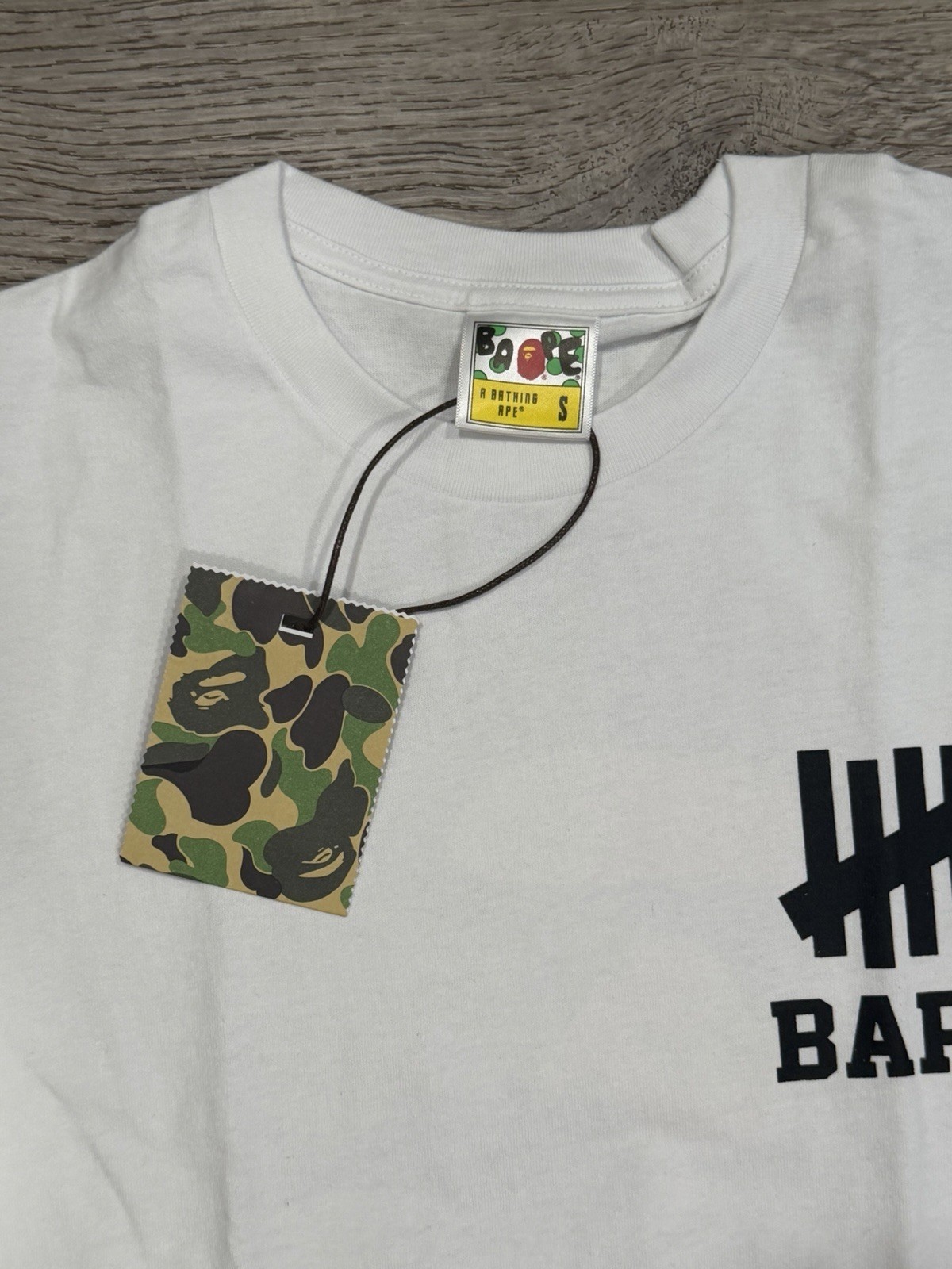 BAPE × undefeated logo T-shirt White A Bathing Ape Size S