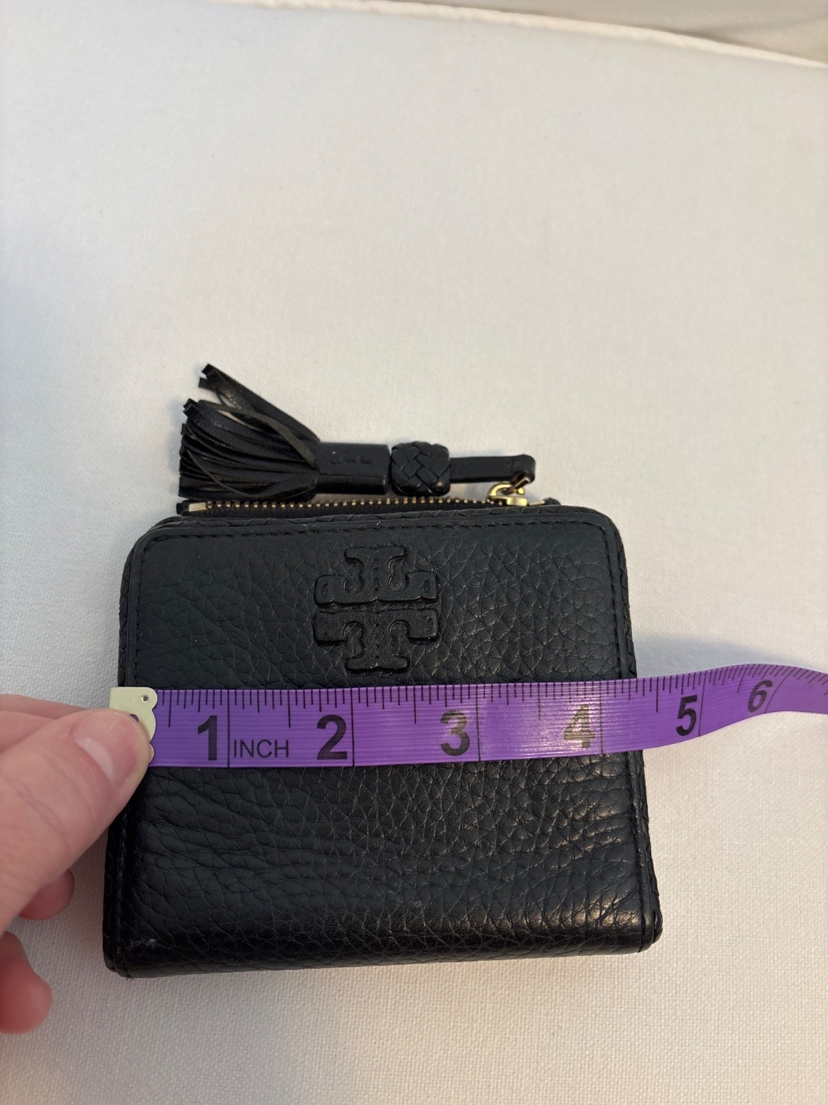 Tory Burch Thea Black Pebbled Leather Bifold Zip Wallet Tassel Gold Tone Logo