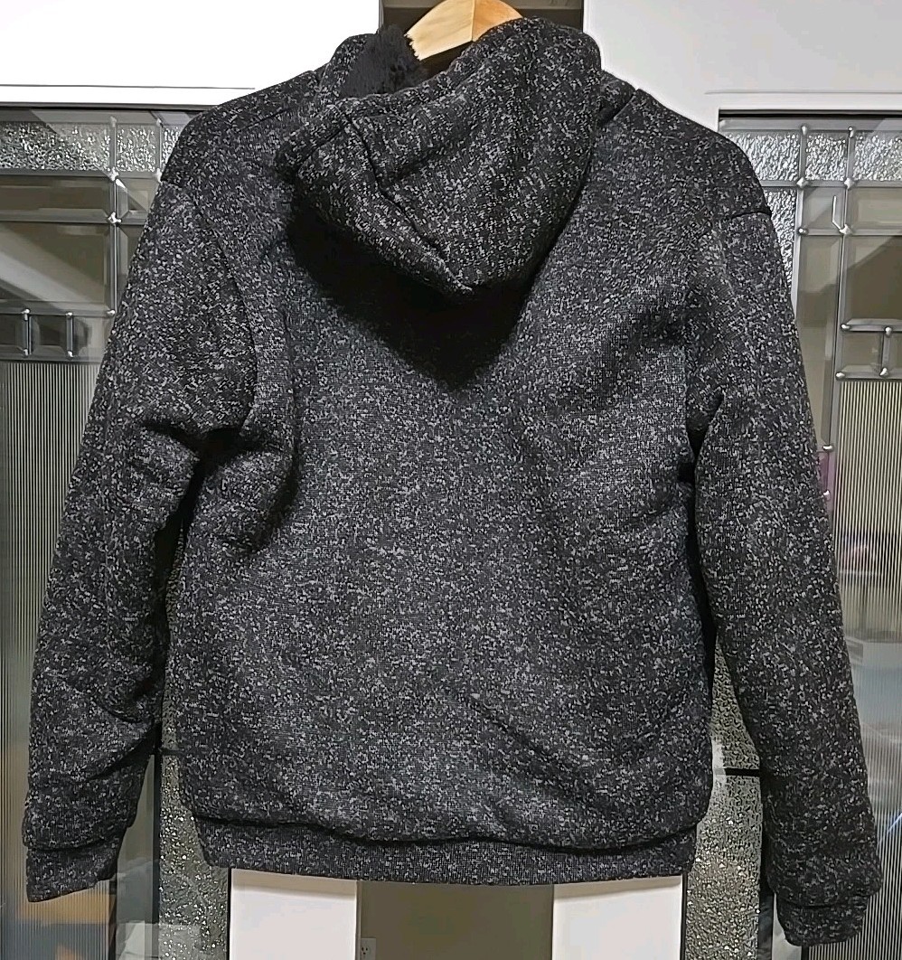 Australia Size Small hooded Jacket. It has a Kangaroo Embroidered on The Front