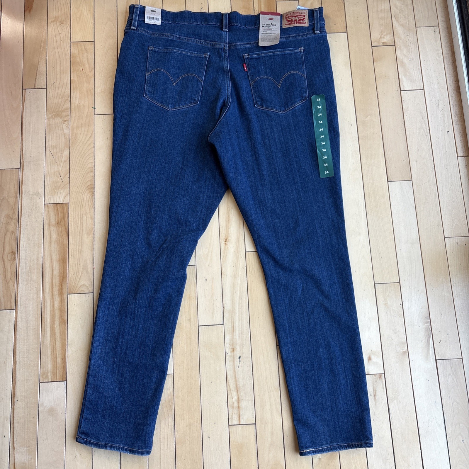 NWT Levi’s 311 Shaping Skinny Jeans Women’s Size 34Wx30L Dark Wash Distressed