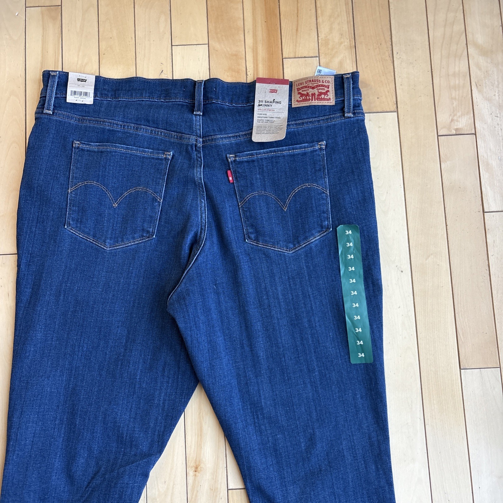 NWT Levi’s 311 Shaping Skinny Jeans Women’s Size 34Wx30L Dark Wash Distressed