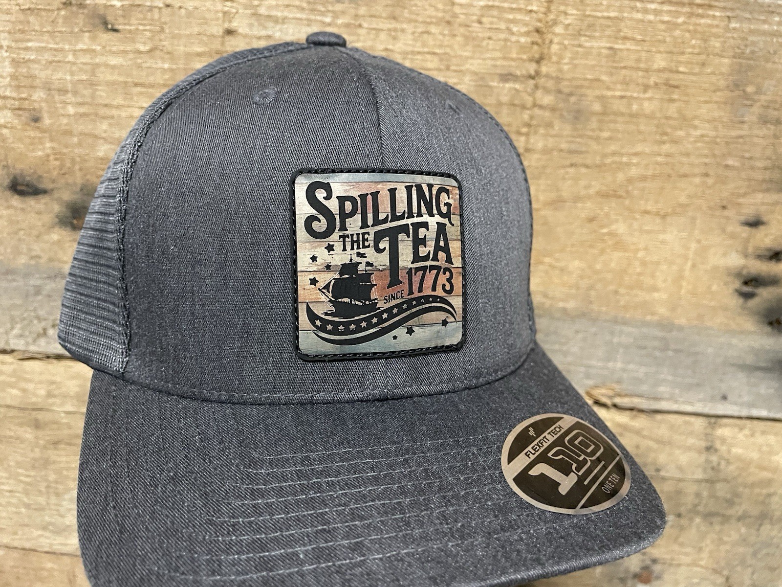 Spilling The Tea Wood Grain- Grey Flexfit 110M SnapBack Trucker Hat
