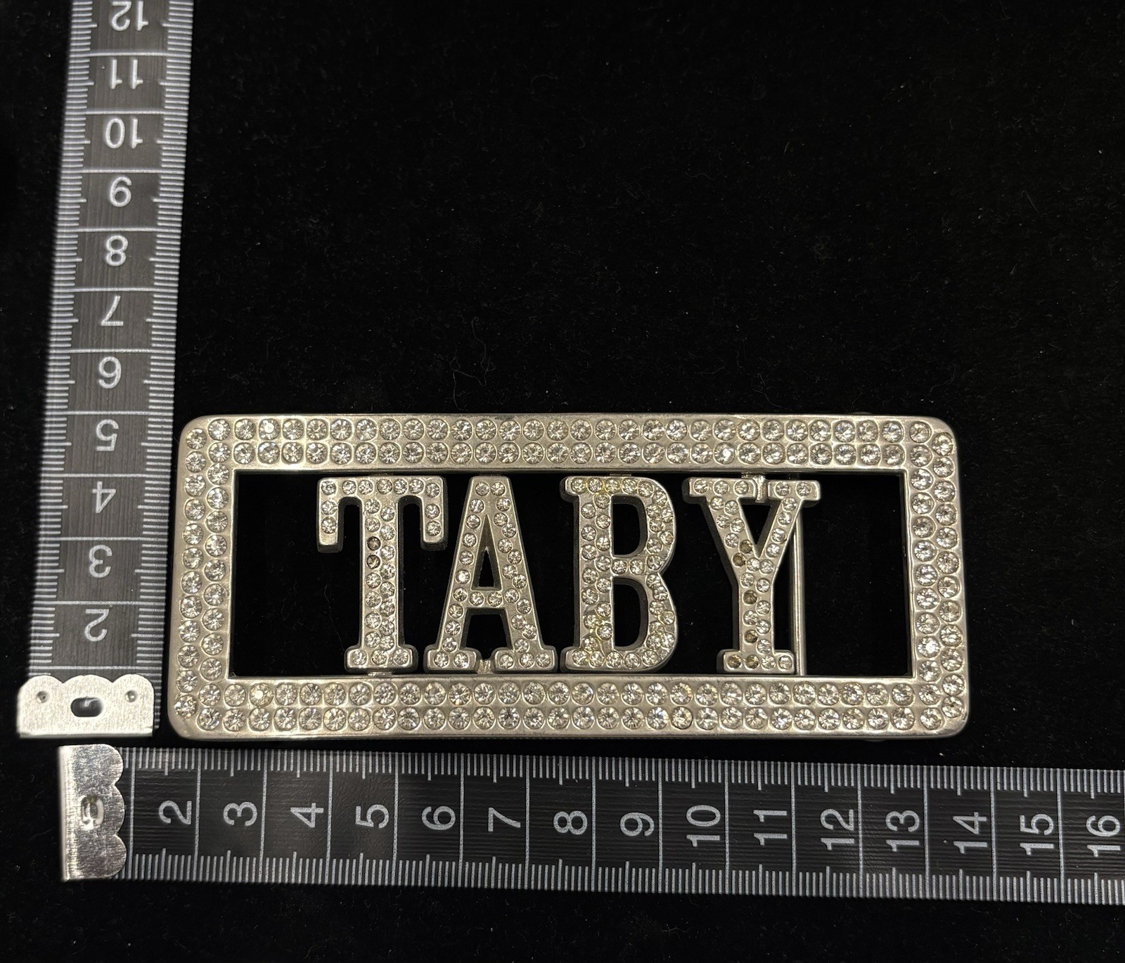 vintage Y2K-style belt buckle features “TABY” rhinestones rectangular frame RARE
