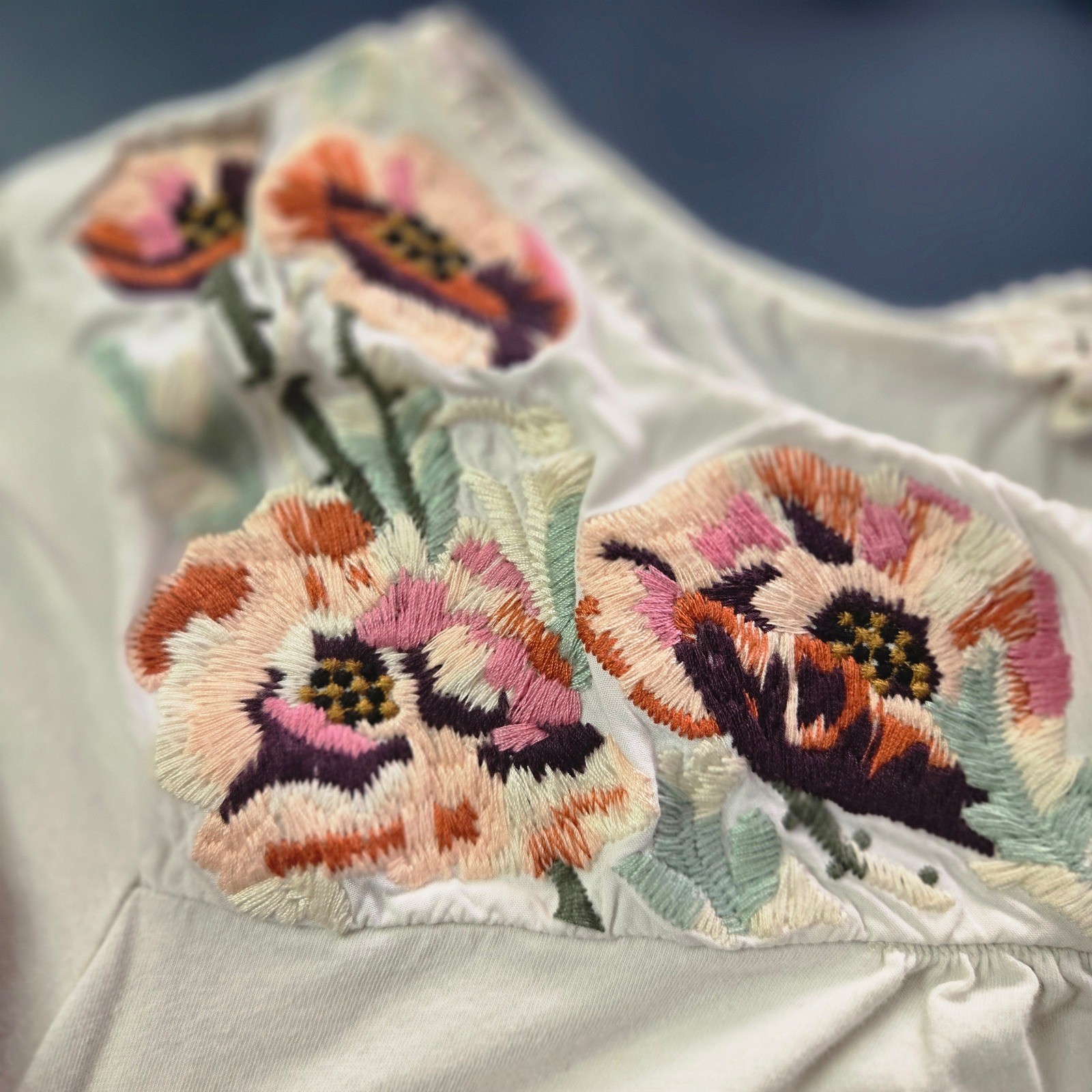 Anthropologie Tiny Ivory Floral Embroidered Pom Pom Trim Blouse XS Short Sleeve