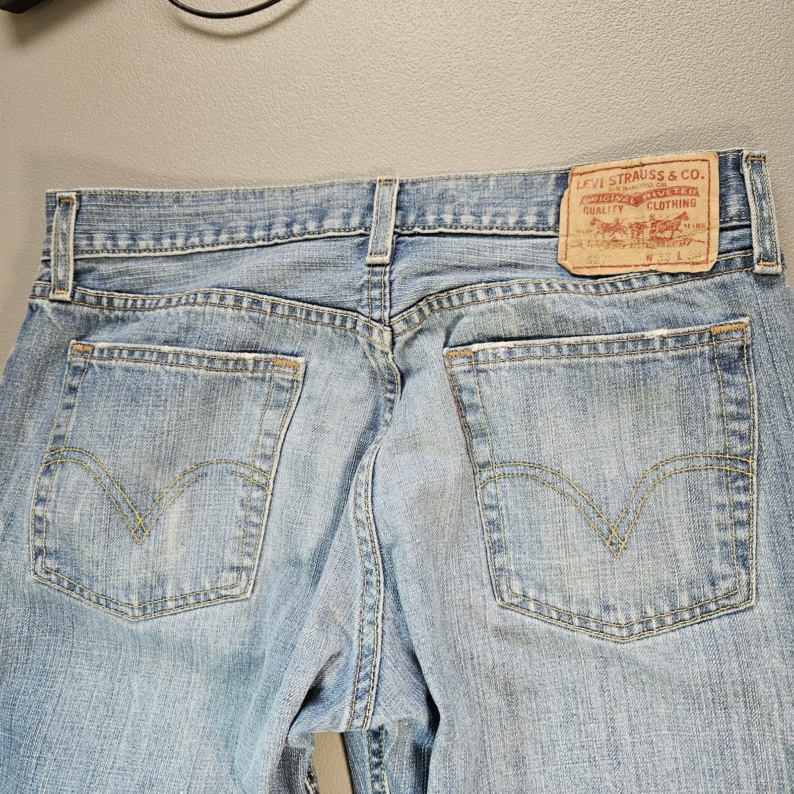 Levi’s 527 Denim Jeans Low Boot Cut Men’s 33×34 Blue Distressed Med Wash
