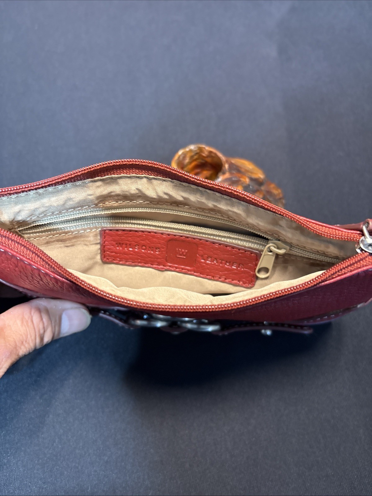 Wilson Leather Red leather buckle accent wristlet