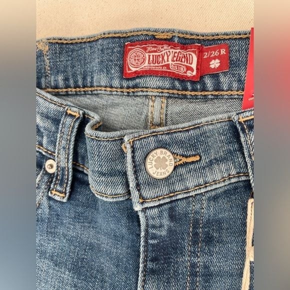 Lucky Legend Easy Rider Jeans. Color: Patch Match Wash. Size 2/ 26 R