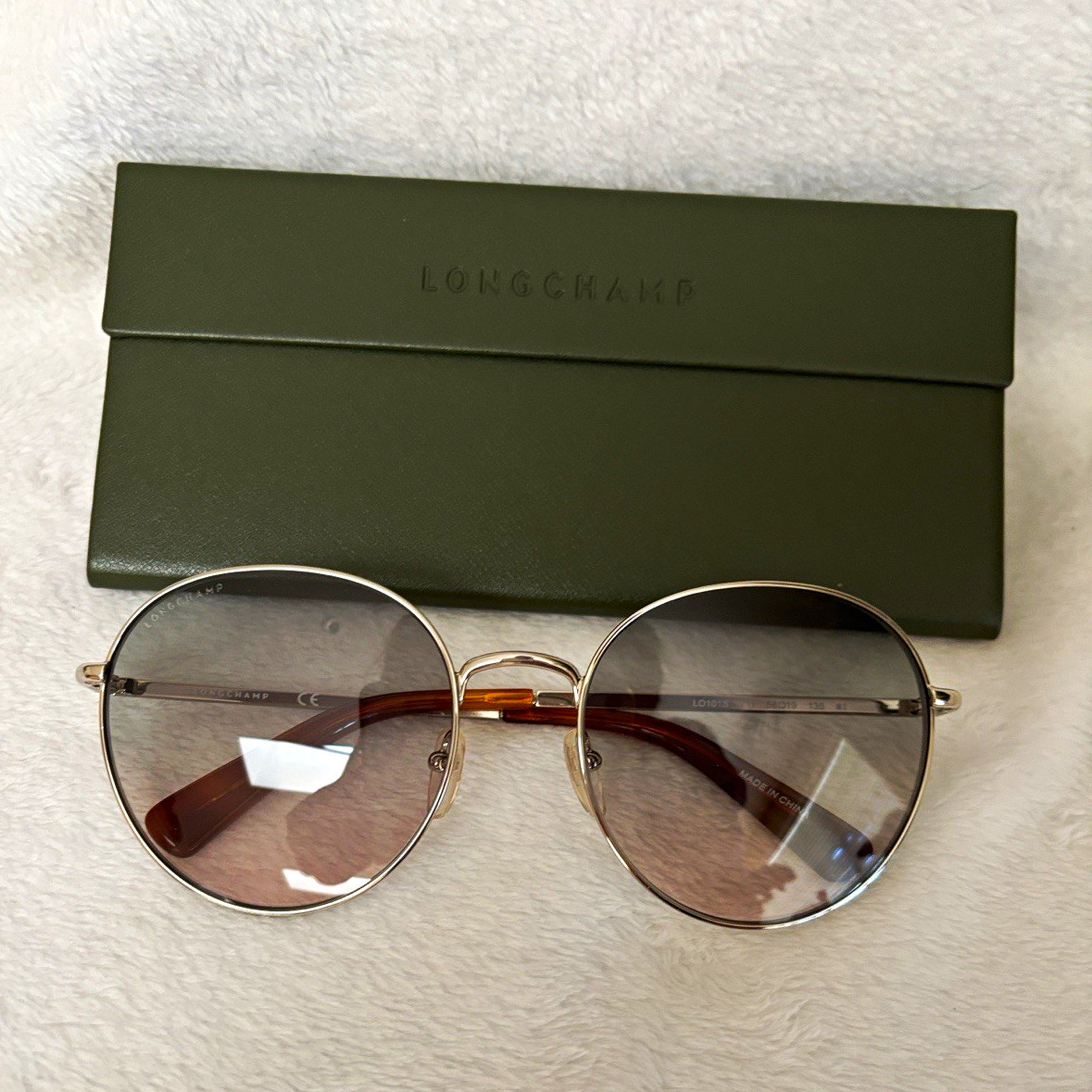 Longchamp LO101S Round Metal Sunglasses Gold Frame Brown Gradient Tinted 135