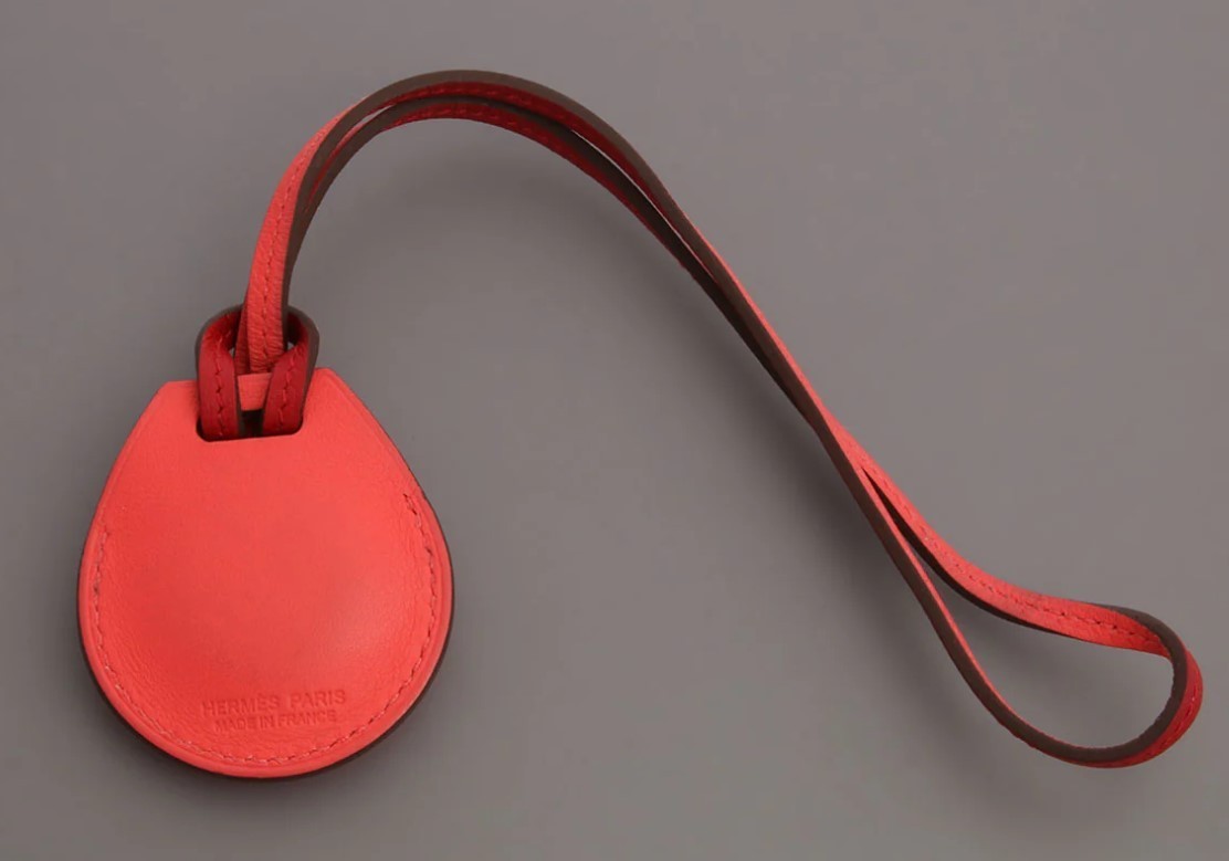 Hermès’ Rose Texas Apple AirTag Bag Charm