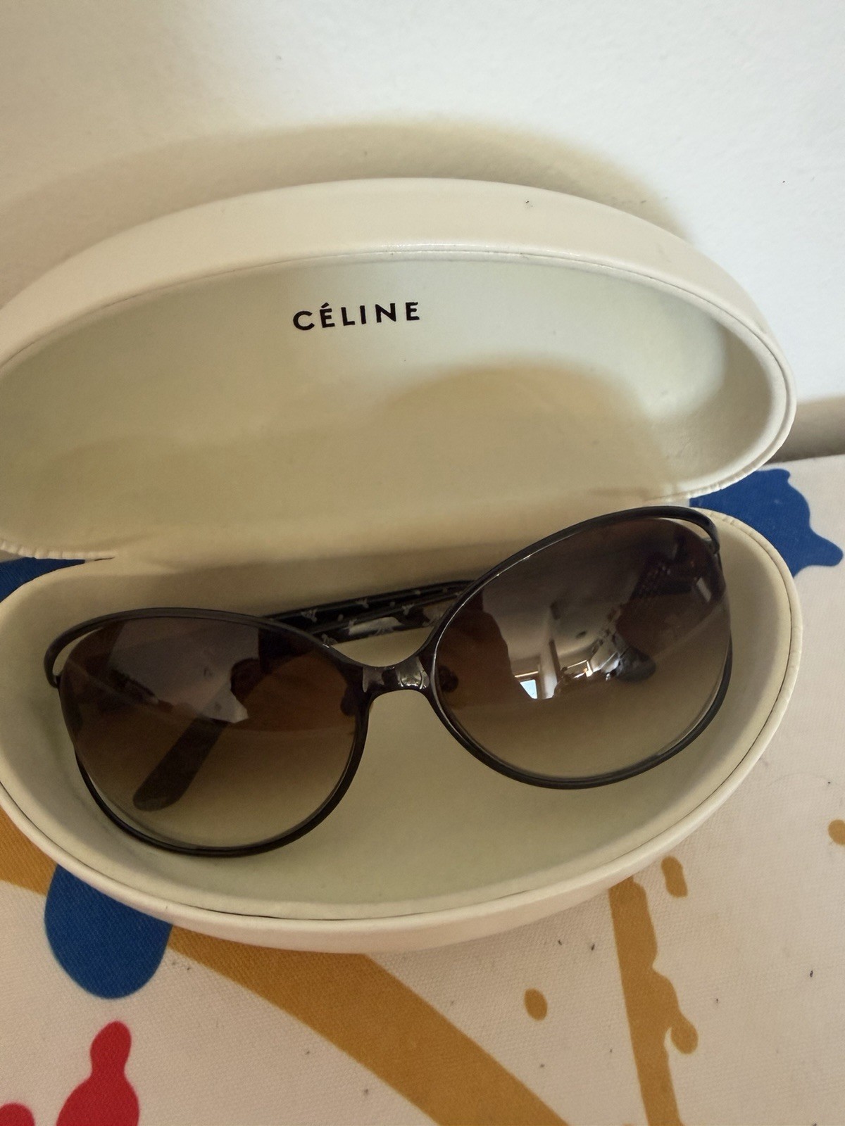 CELINE SC 1441G Oval Sunglasses Black Frame Brown Gradient Lenses UV400