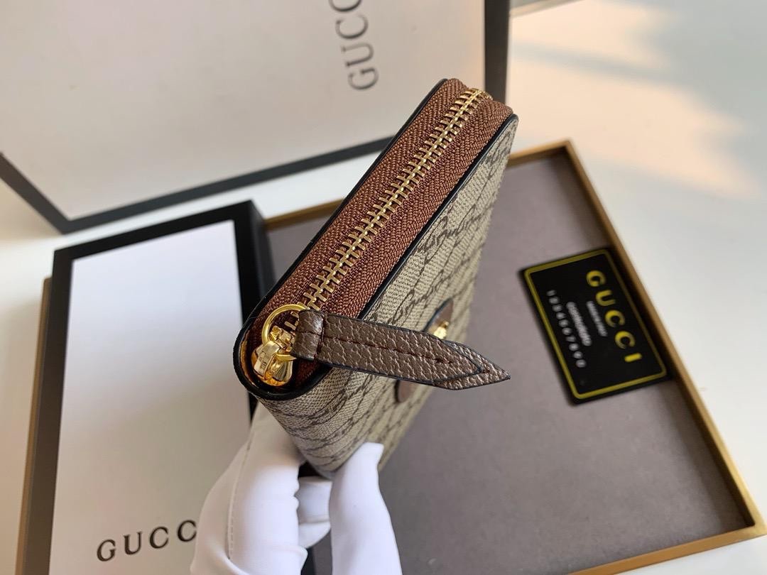 Gucci Wallet brown monogram GG zip around