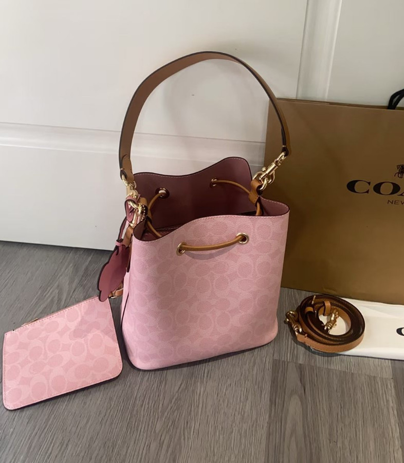 NWT Coach CEA23 Rowan Bucket Bag In Signature Canvas With Charms Powder Pink